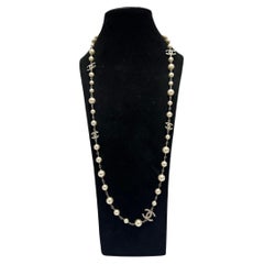 Used Chanel necklace pearls and CC