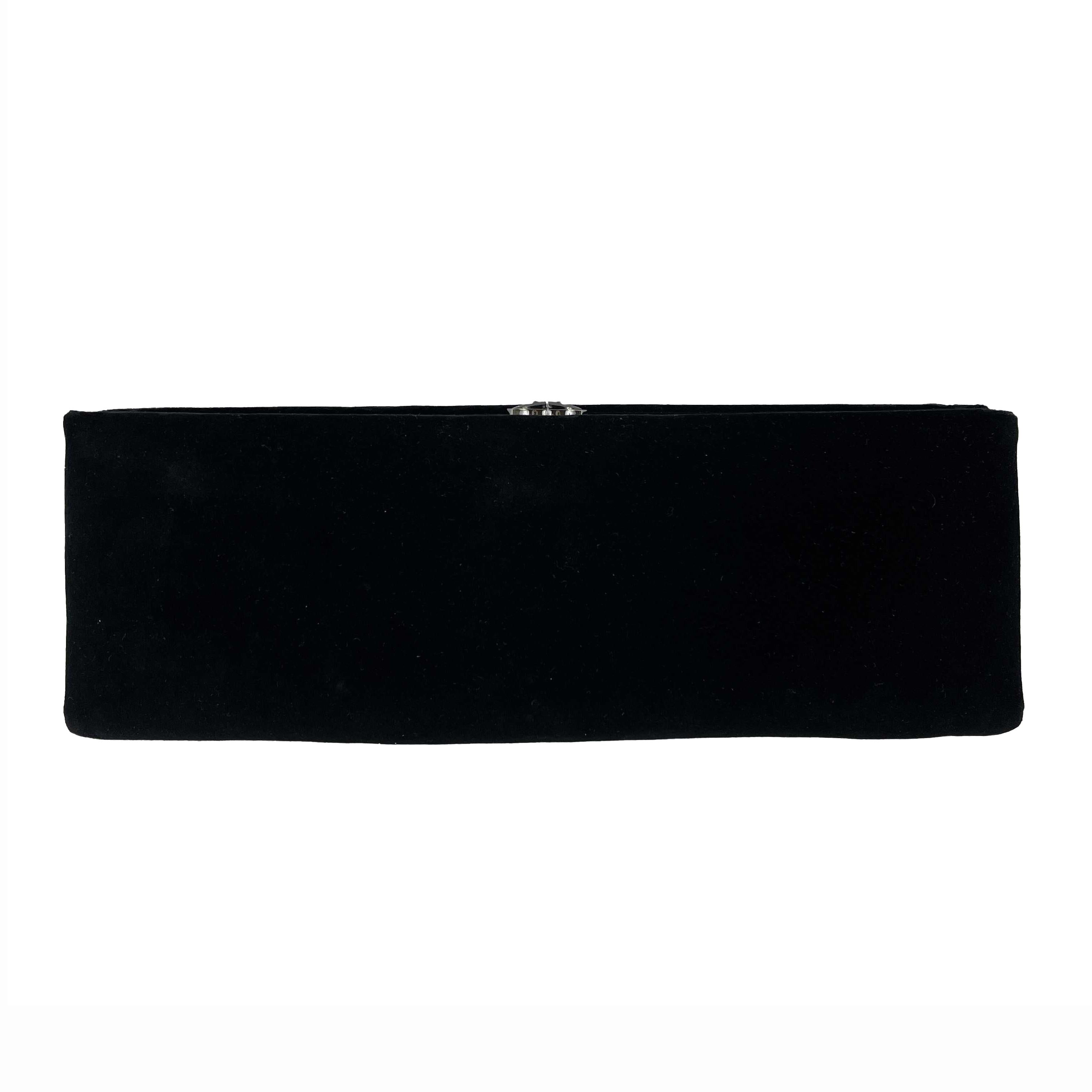 * Fall Metiers d'Art 2015 Collection.
* This clutch is crafted of sumptuous black velvet fabric.
* Features embellished feathers, sequins and crystals in the shape of butterflies and feathers.
* Opens with a faceted black Chanel CC push lock to a