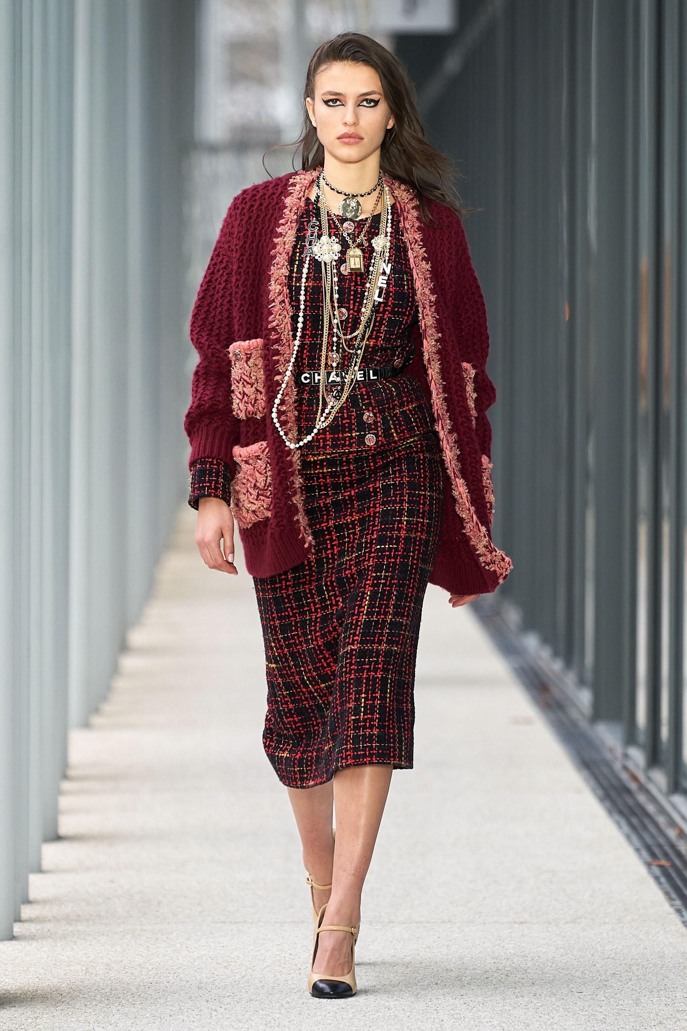Luxurious Chanel black & red logo ribbon tweed jacket  
~ from Runway of fresh 2022 Pre-Fall Collection, Metiers d'Art

Size mark 38 FR. Never worn

- CC logo jewel Gripoix buttons
- most precious Lesage ribbon tweed
- black silk lining