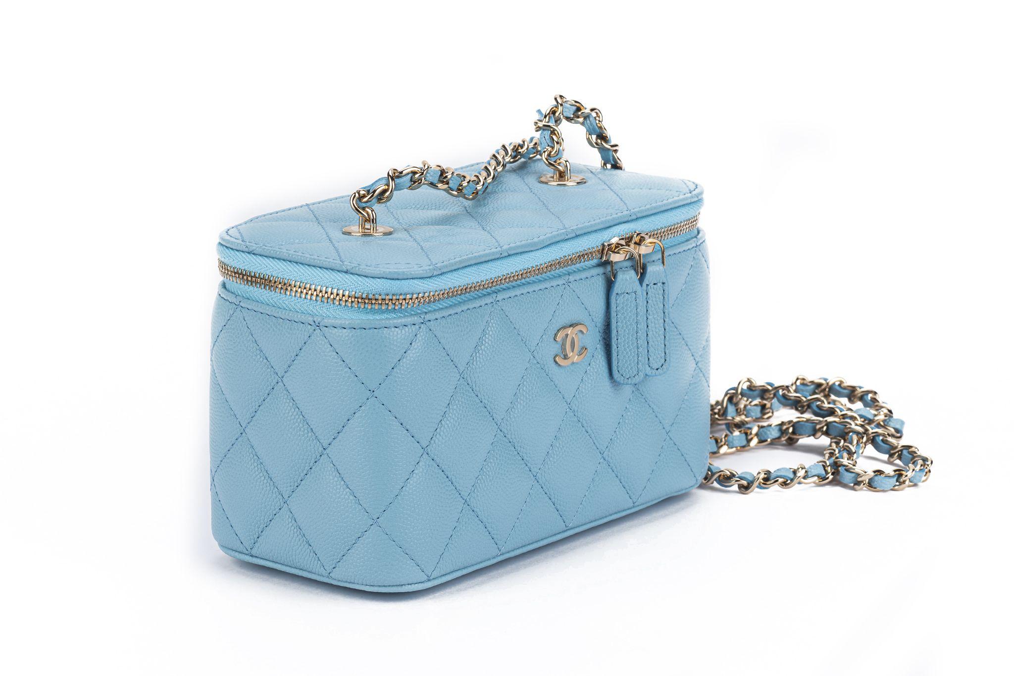 Chanel brand new 2022 collection celeste caviar  quilted small rectangular trunk bag. Shoulder drop 22”. Serial number 32. Hologram, ID card, dust cover and box.