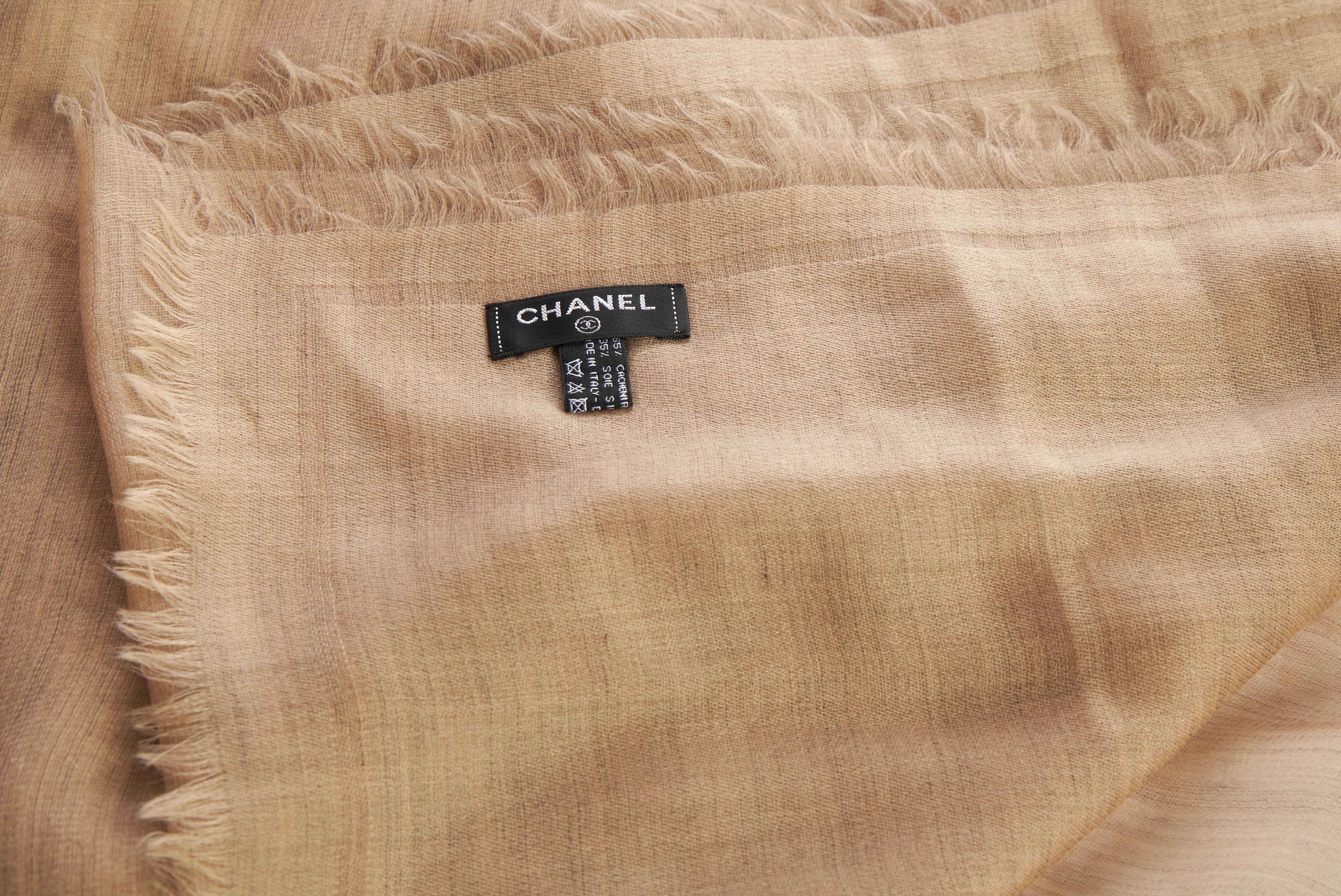 Chanel oversize brand new shawl , beige with fluorescent orange logo. 65% cashmere, 35% silk. Comes with original care tag.