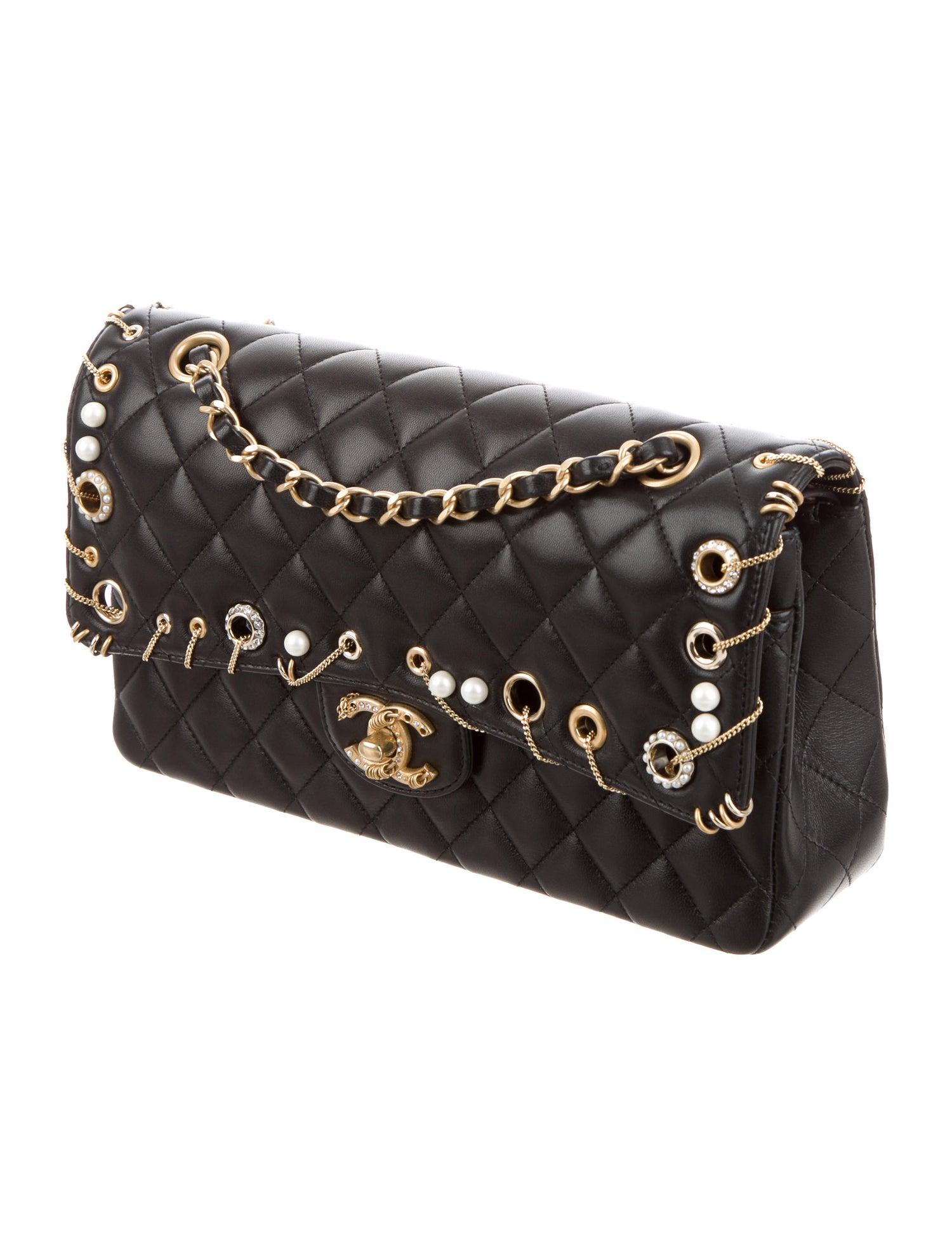 Chanel NEW Black Leather Gold Charm Chain Pearl Evening Shoulder Flap Bag in Box 

Leather 
Strass
Faux pearl
Gold-tone hardware
Leather lining
Turn lock closure
Made in France
Date code present
Shoulder strap drop 20