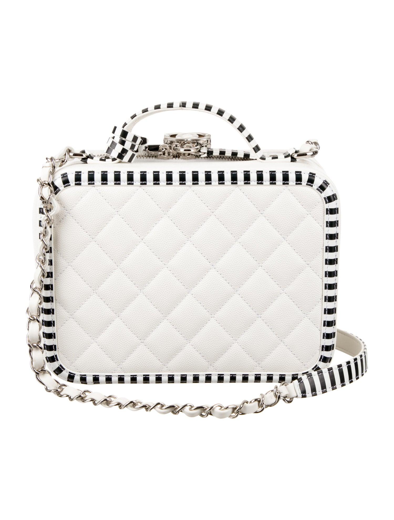 Chanel NEW Black White Leather Top Handle Satchel Shoulder Travel Bag in Box

Caviar leather 
Silver-tone hardware
Leather lining
Zip closure
Date code present
Handle drop 1.5