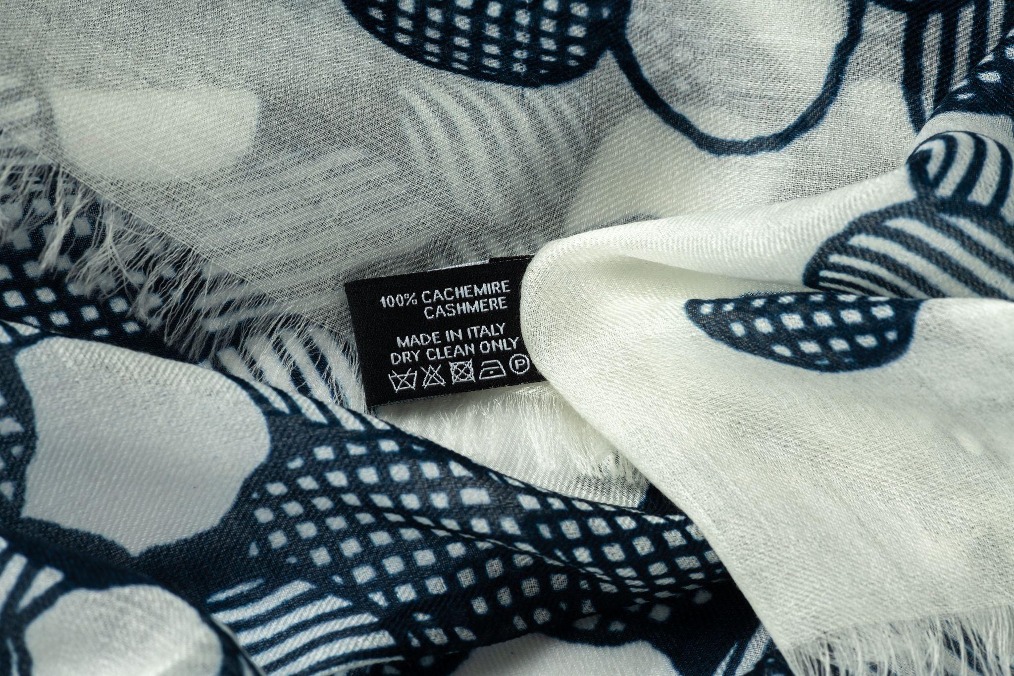 Chanel new camellia cashmere shawl in blue and white . Original care tag.