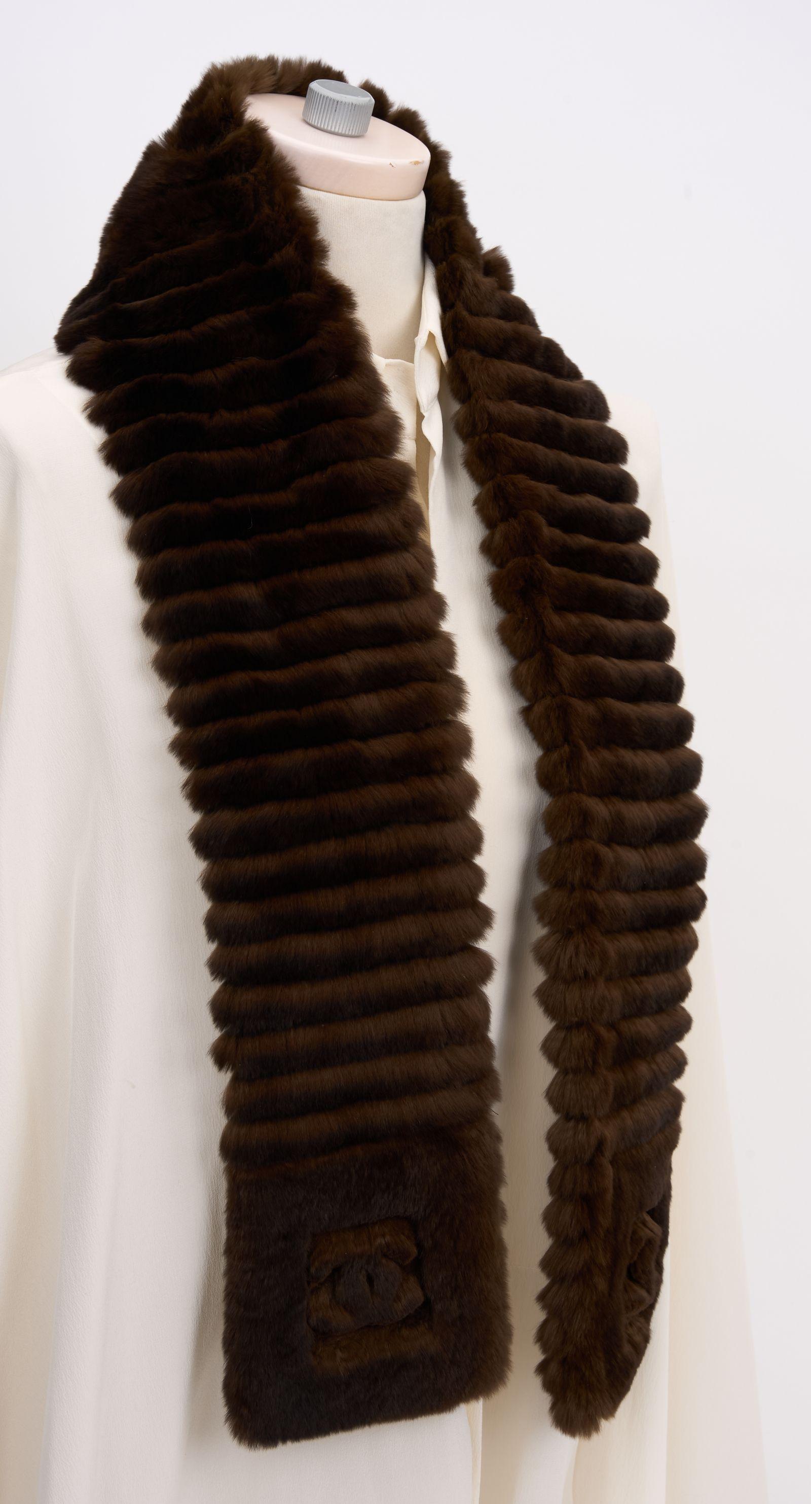 This Chanel scarf is crafted in an ultra-soft rabbit fur blend with 'CC' logos on both ends. Made from 70% Orylag, and 30% Cashmere. Brand new in unused condition.