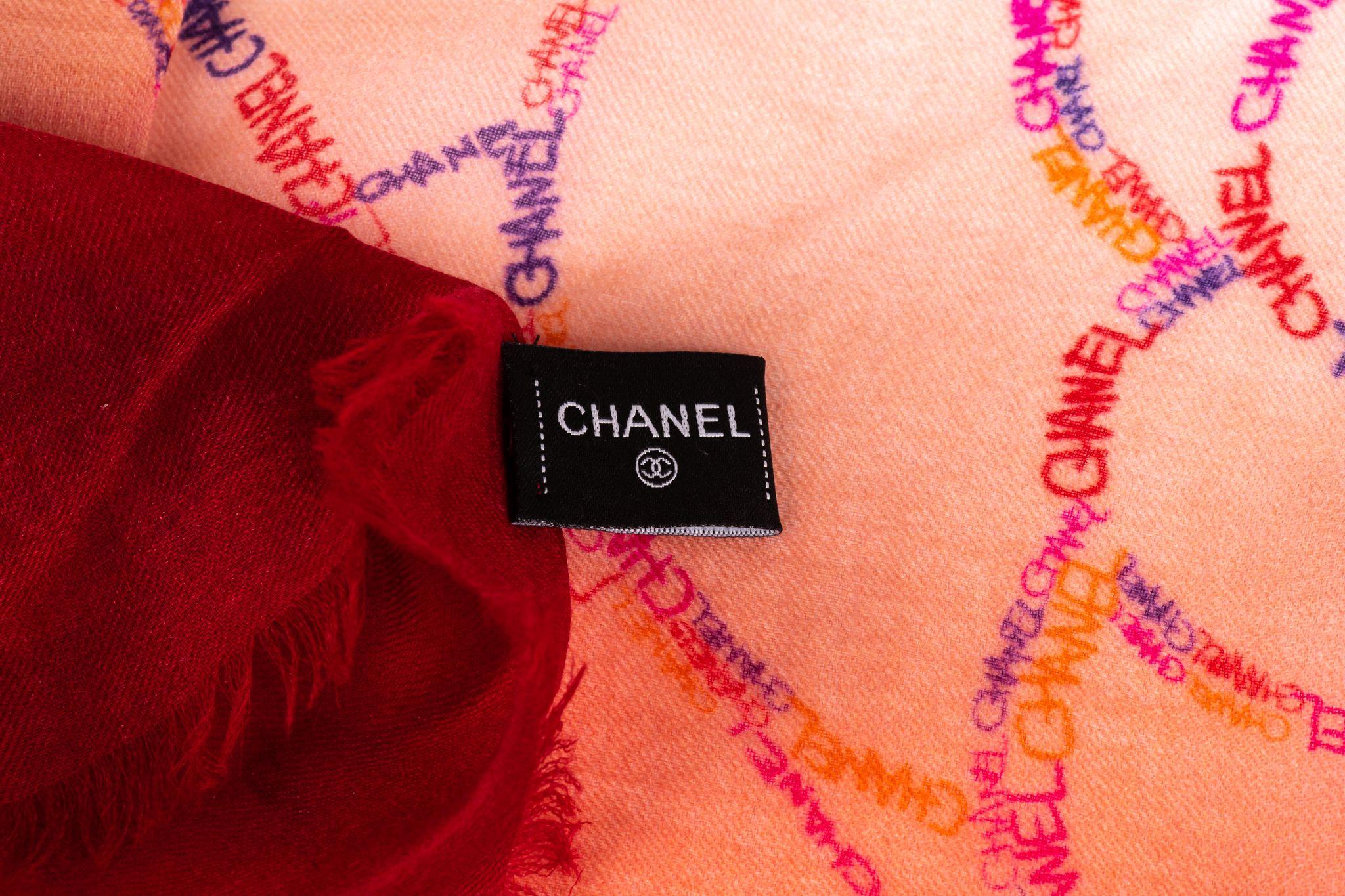 Chanel new cashmere shawl in degrade fuchsia -red . Camellia drawings. Care tag attached.