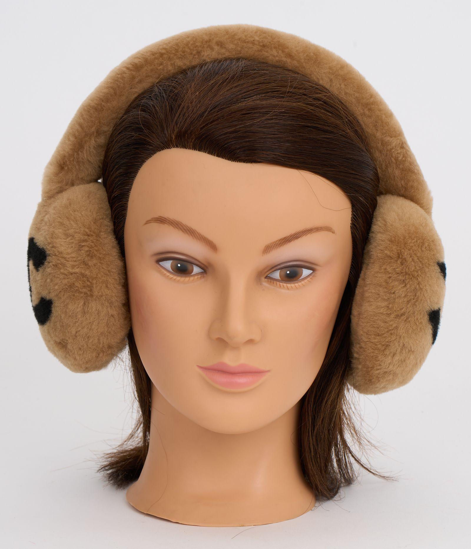 Original Chanel CC Shearling Ear Muffs in caramel and black. The earmuffs are made out of shearling and have a CC logo on each side. The piece is brand new.