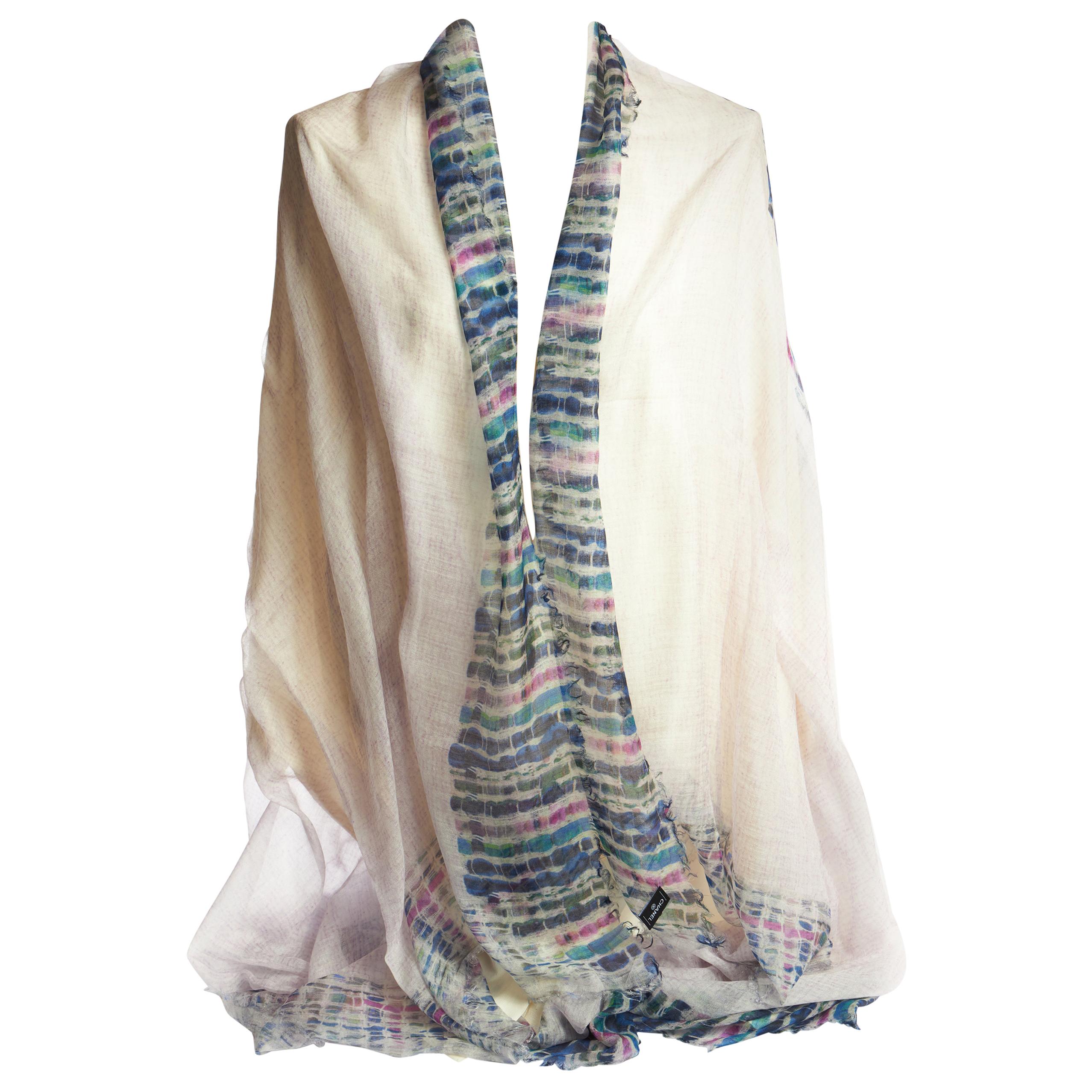Chanel brand new in unworn condition oversize square shawl. CC logo design. Silk and cashmere blend. Original care tag.