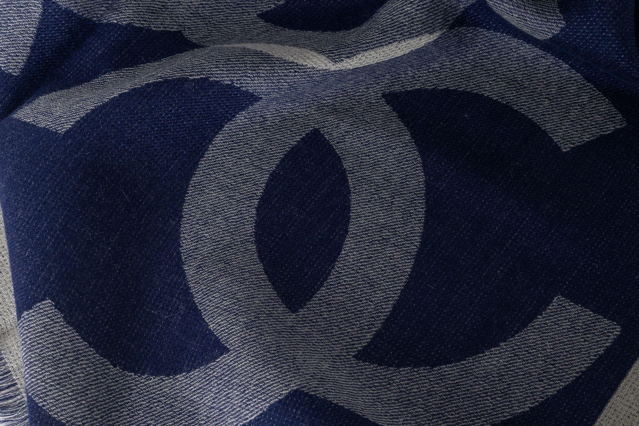 Chanel Cashmere Shawl in navy. The pattern features big overlapping CC logos. The item is in new condition.