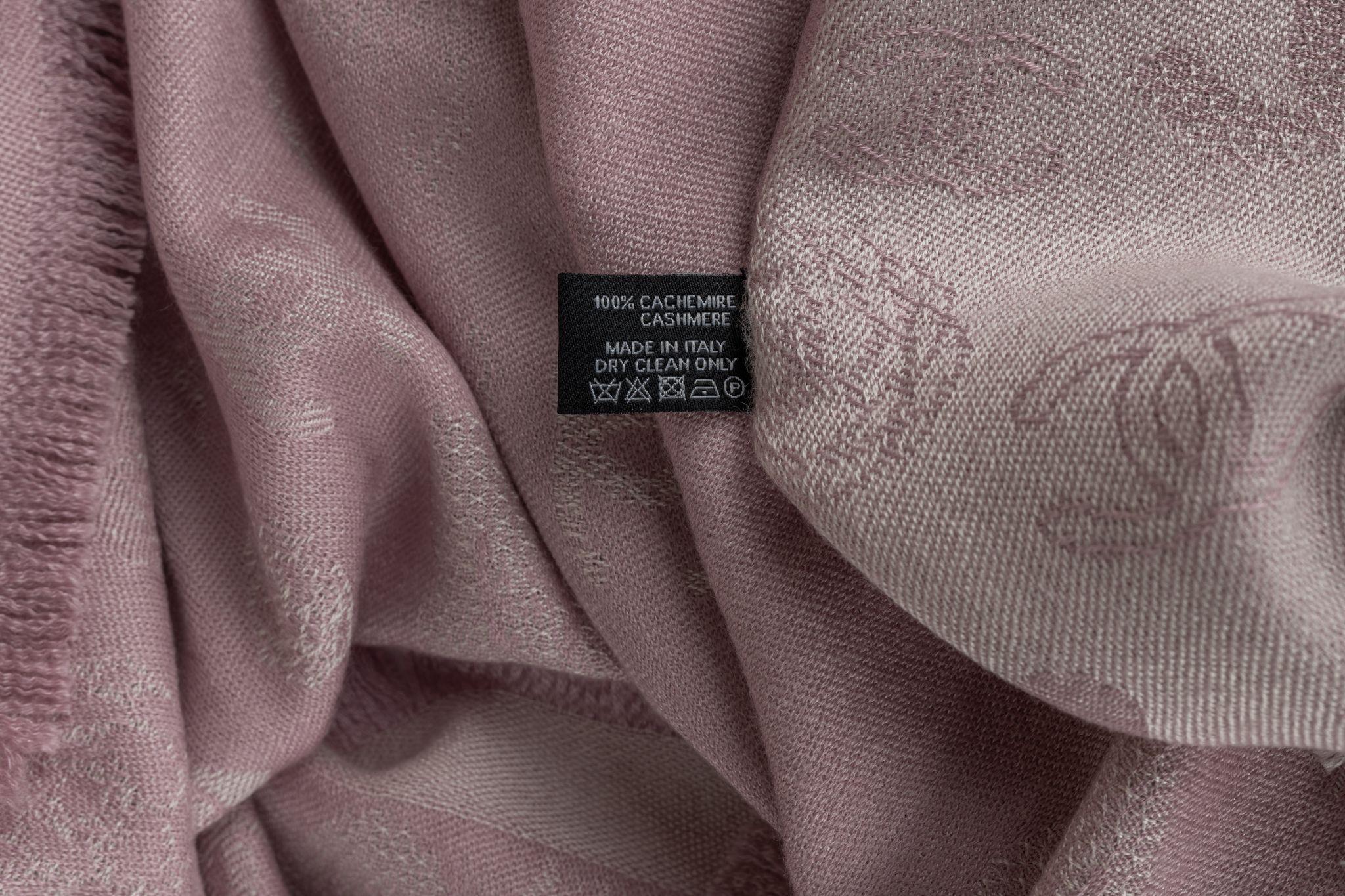 Chanel Cashmere Shawl in pink. The pattern features hearts and small CC logos. The item is in new condition.