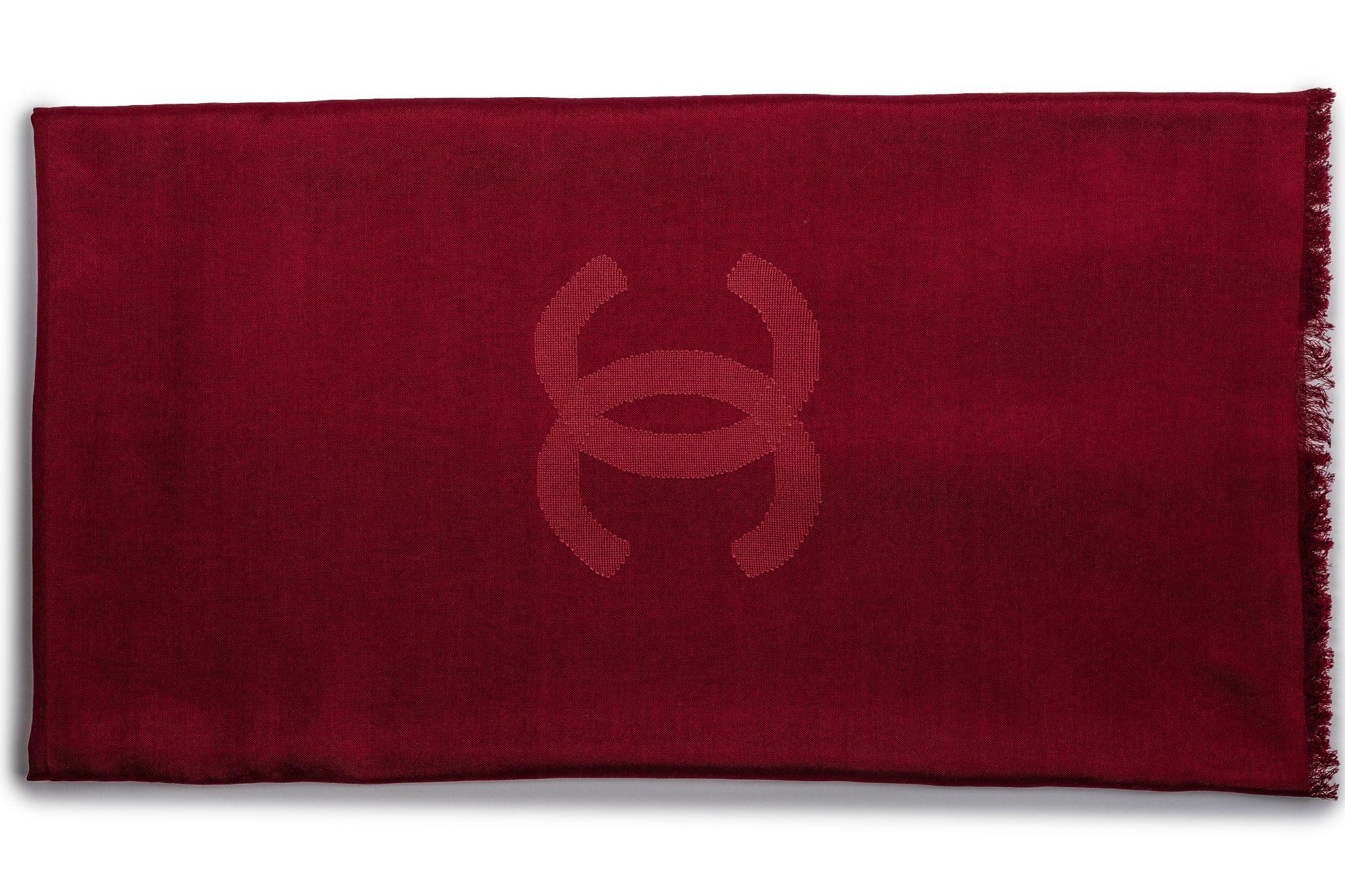 Chanel Cashmere Shawl in red. The pattern features several CC logos. The item is in new condition.