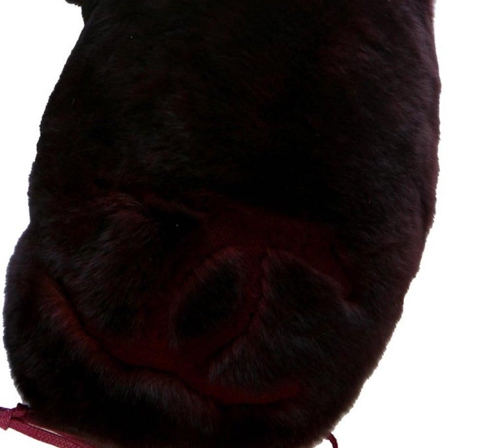 Orylag fur
Woven underside 
Drawstring closure
Made in France
Measures 13.5