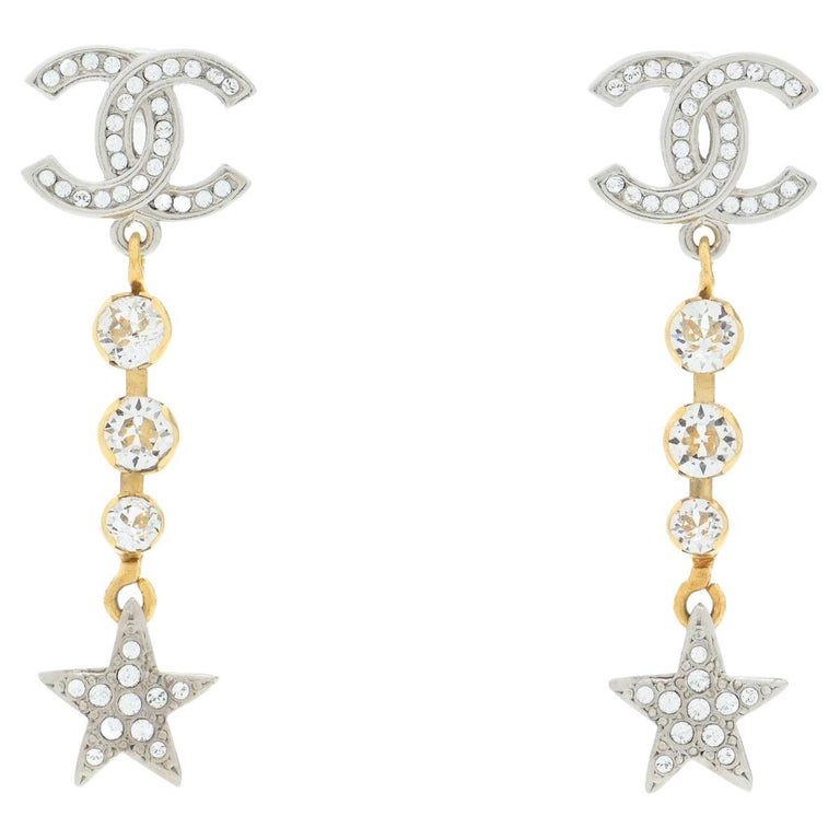 CHANEL NEW CC Crystal Gold and Silver Metal Star Dangle Drop Evening  Earrings at 1stDibs