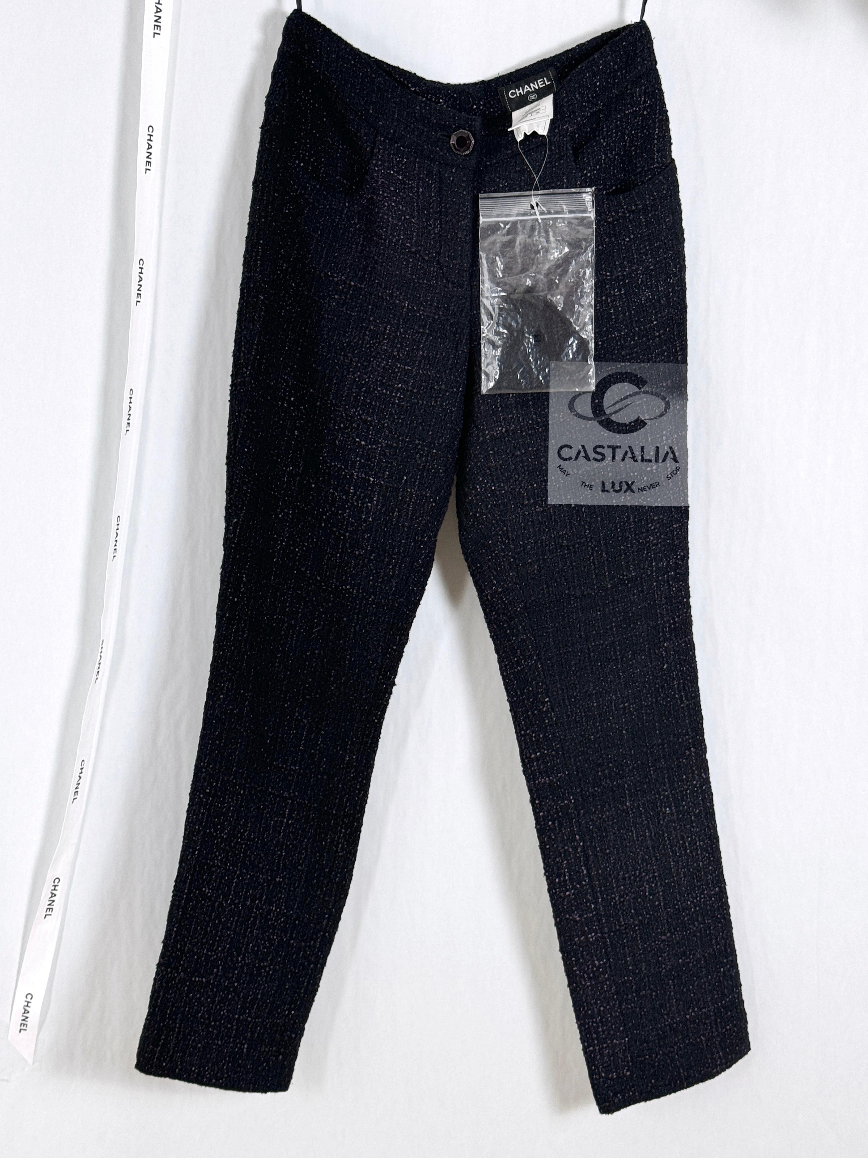 New Chanel black and purple tweed trousers from 'CRYSTALS' Collection by Karl Lagerfeld.
- CC logo jewel buttons at center front
- full silk lining
Size mark 36 FR. Comes with extra cloth swatch.