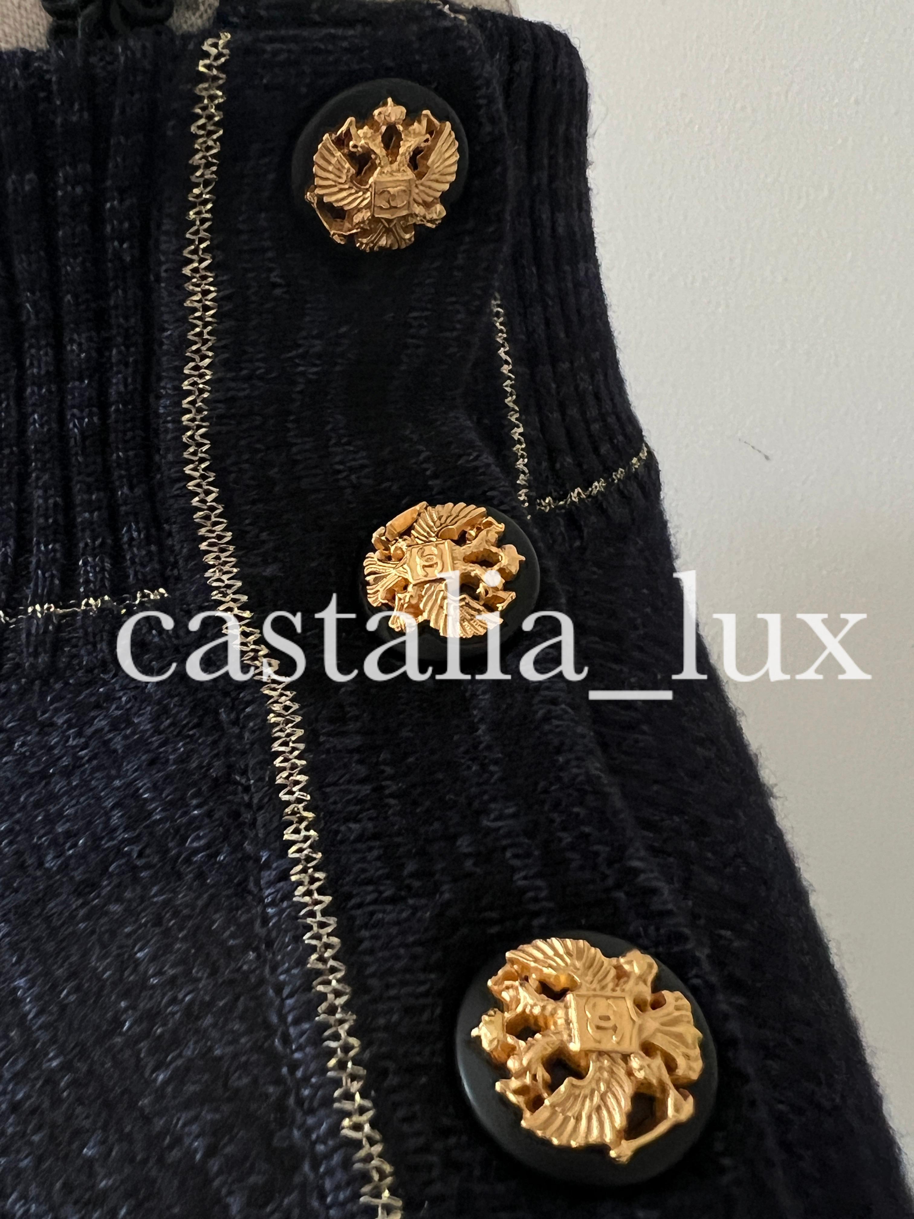 Stunning and rare Chanel jumper with CC logo from 2009 Pre-Fall Metiers d'Art Collection, 09a 
- made of softest wool, silk and cashmere blend 
- CC logo buttons with eagles at each shoulder 
Size mark 36 fr. kept unworn.