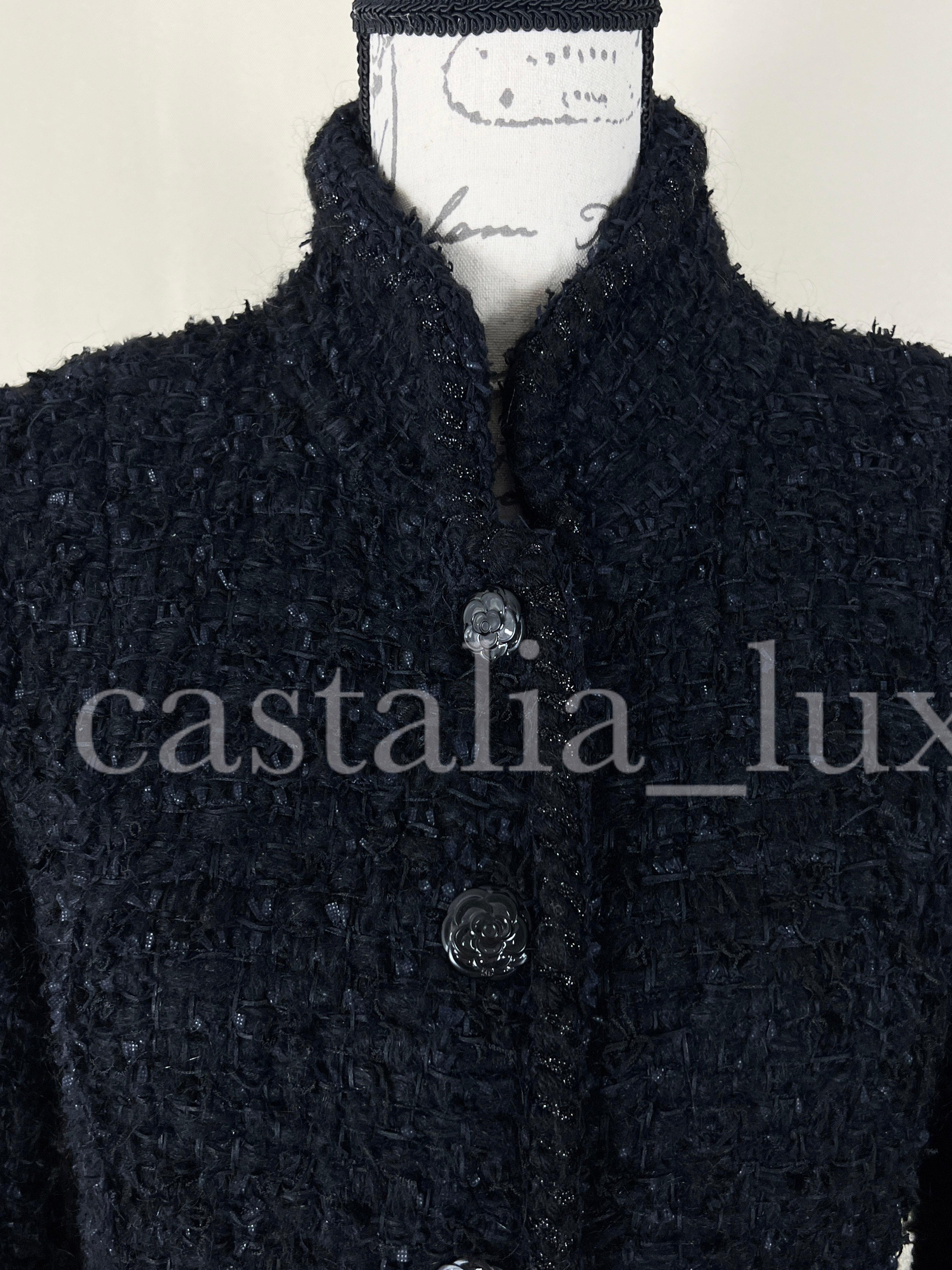 Absolutely stunning Chanel black jacket made of the most precious and expensive Lesage tweed -- from beautiful COCO BRASSERIE Collection by Mr Karl Lagerfeld.
Retail price over 9,000€
Size mark 38 FR. never worn.
- CC logo camellia buttons
-