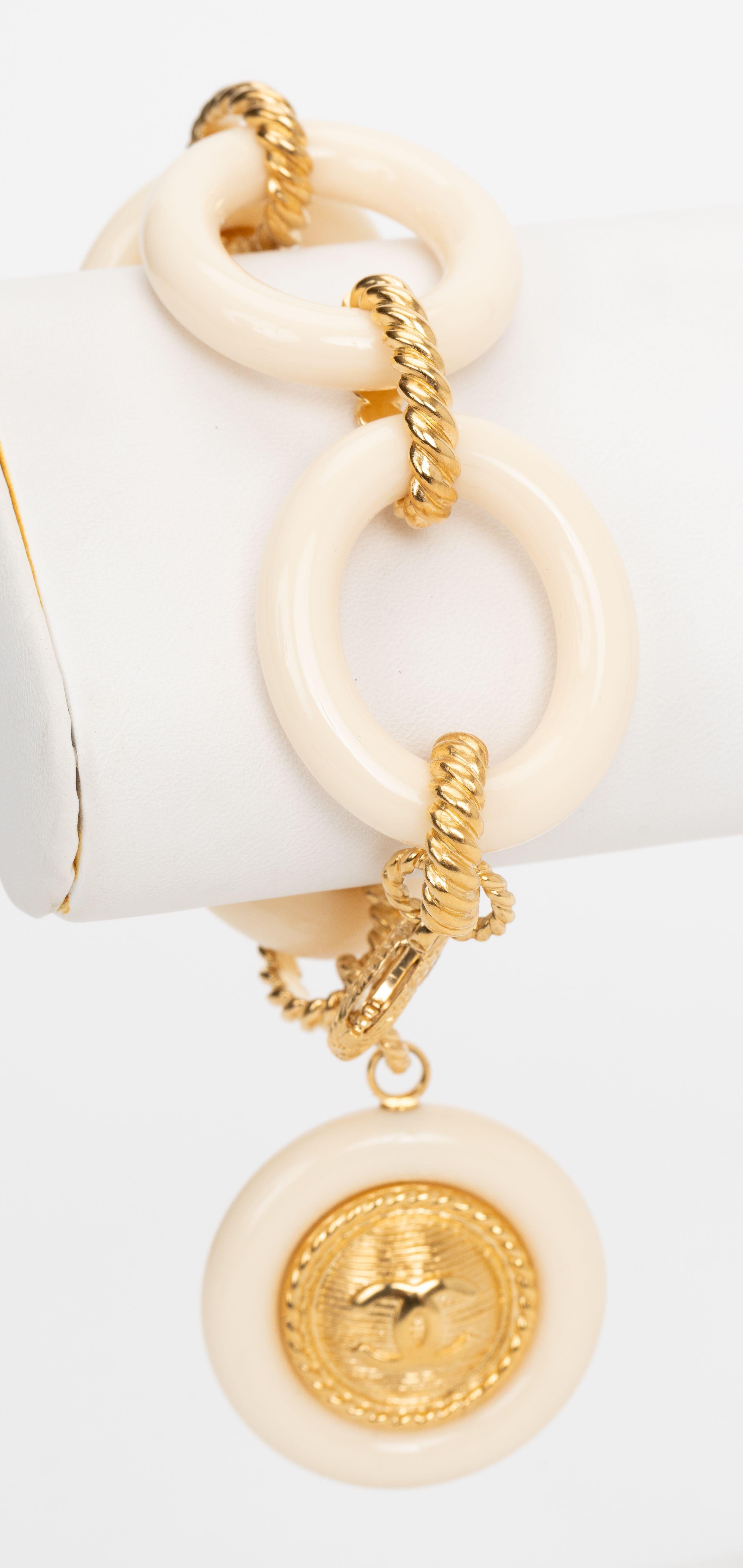 Chanel New Cream Lucite Coin Bracelet In New Condition For Sale In West Hollywood, CA
