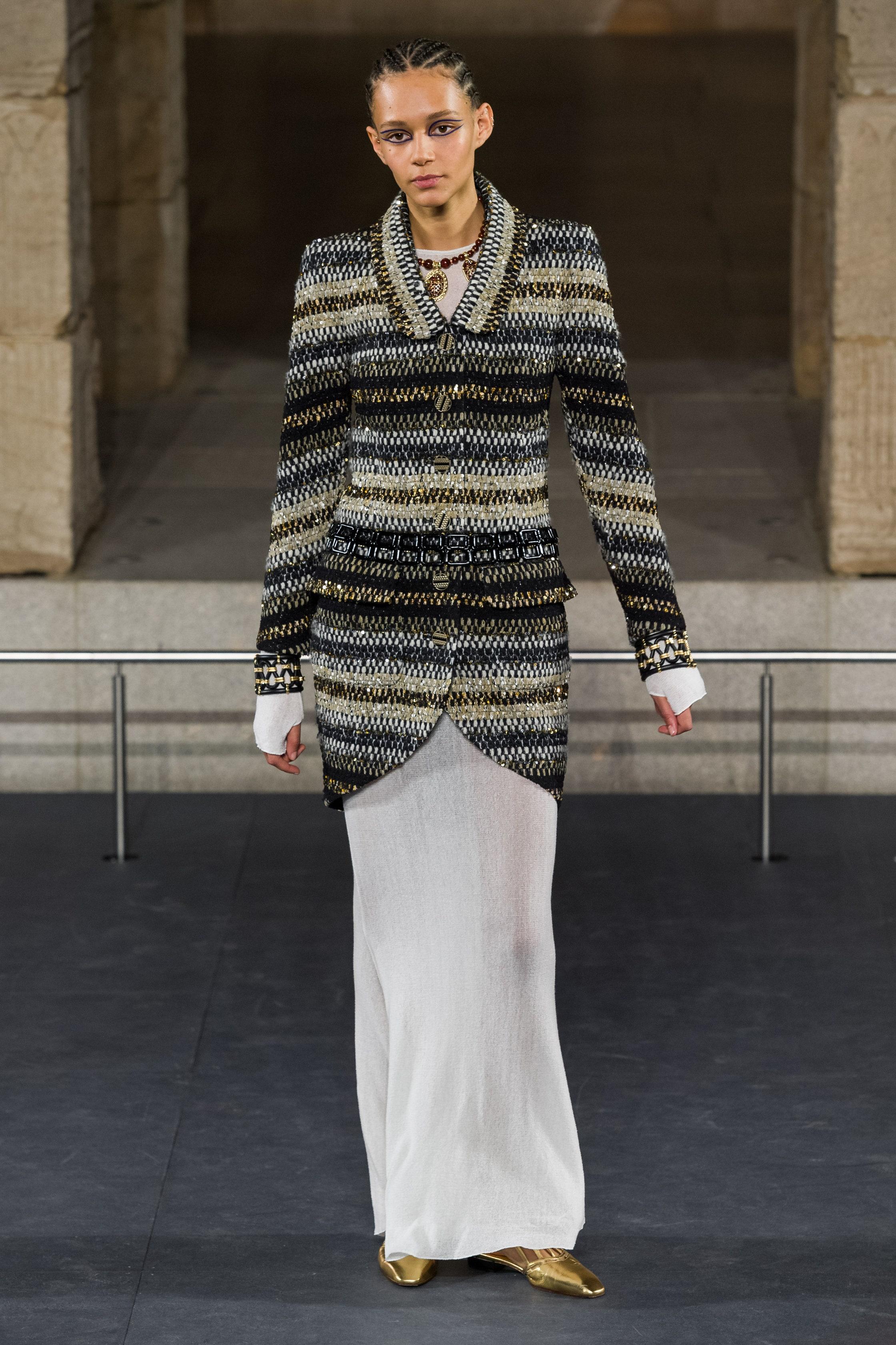 New Chanel woven tweed cardi jacket from 
Paris / New-York 2019 Pre-Fall Fashion Show which took place in Met Museum.
- made of stunning woven fantasy tweed in black, beige with shimmering threads 
- CC logo with symbols of Ancient Egypt (pyramids,