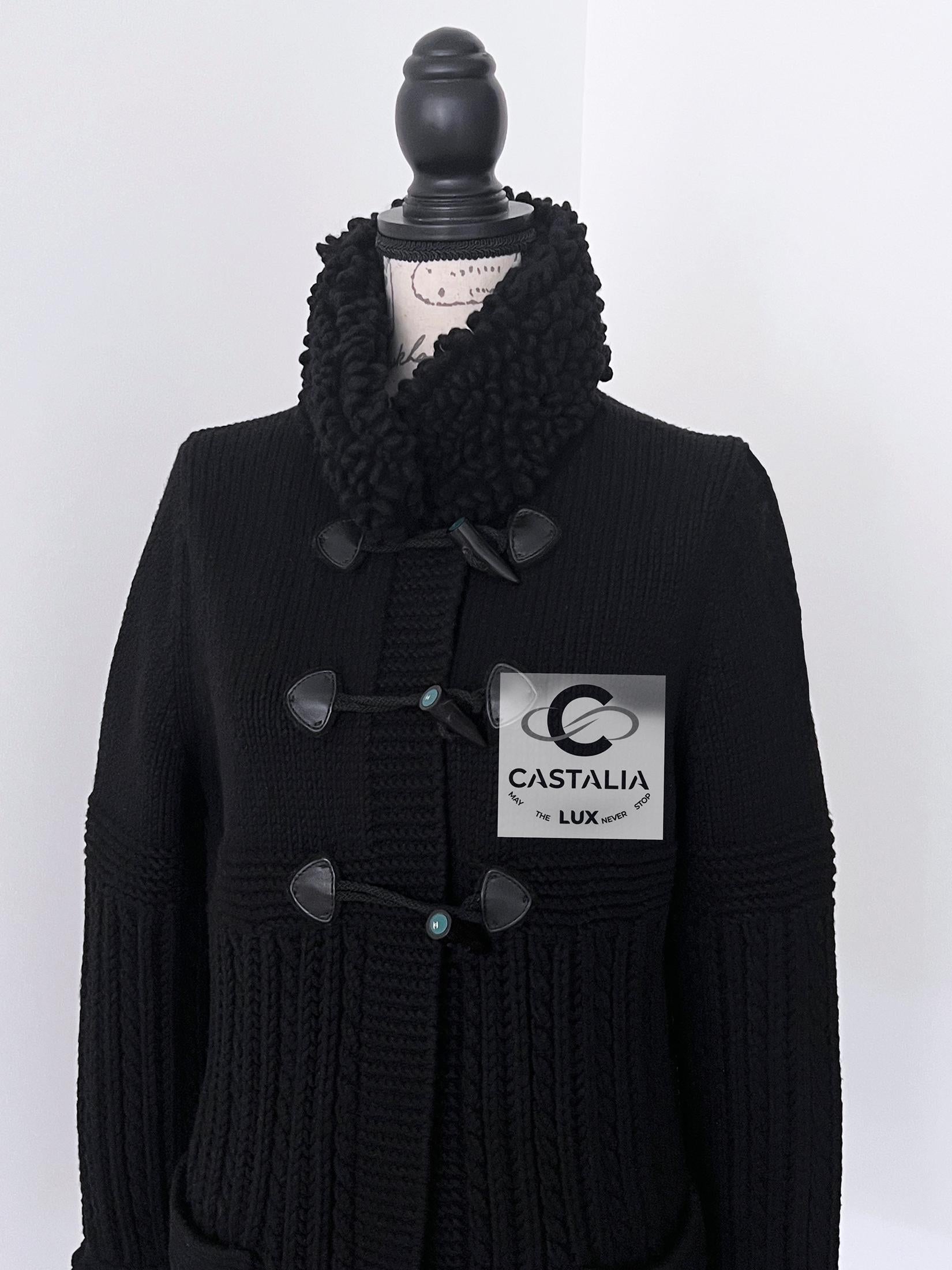 New Chanel heavyweight PURE cashmere cardi coat with CC logo wooden duffle closures at front
- cute fluffy accents at neck and cuffs
- 100% cashmere composition
Size mark 34 FR. Never worn