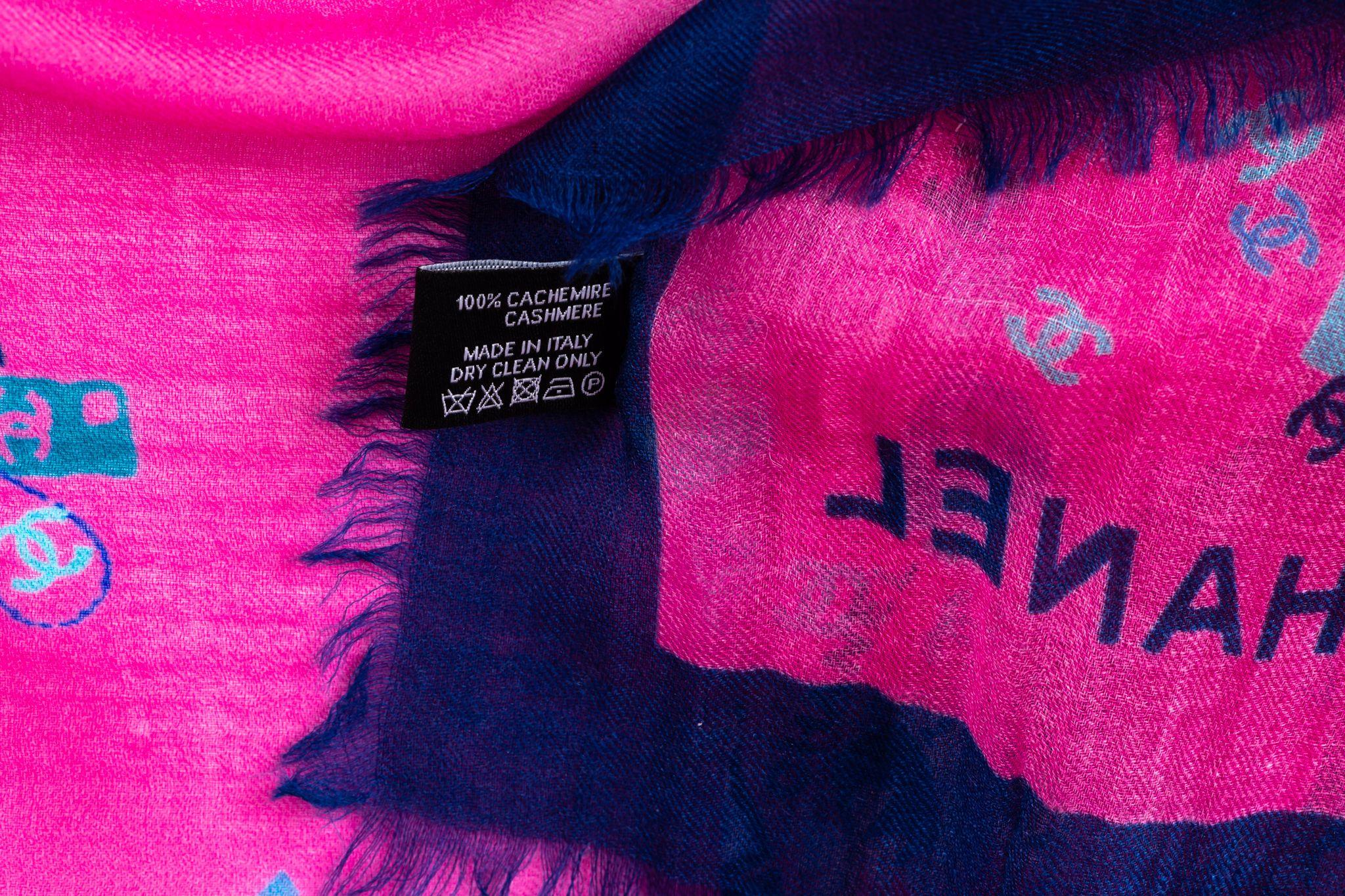 Chanel new lettering cashmere shawl in navy and fuchsia . Original care tag.
