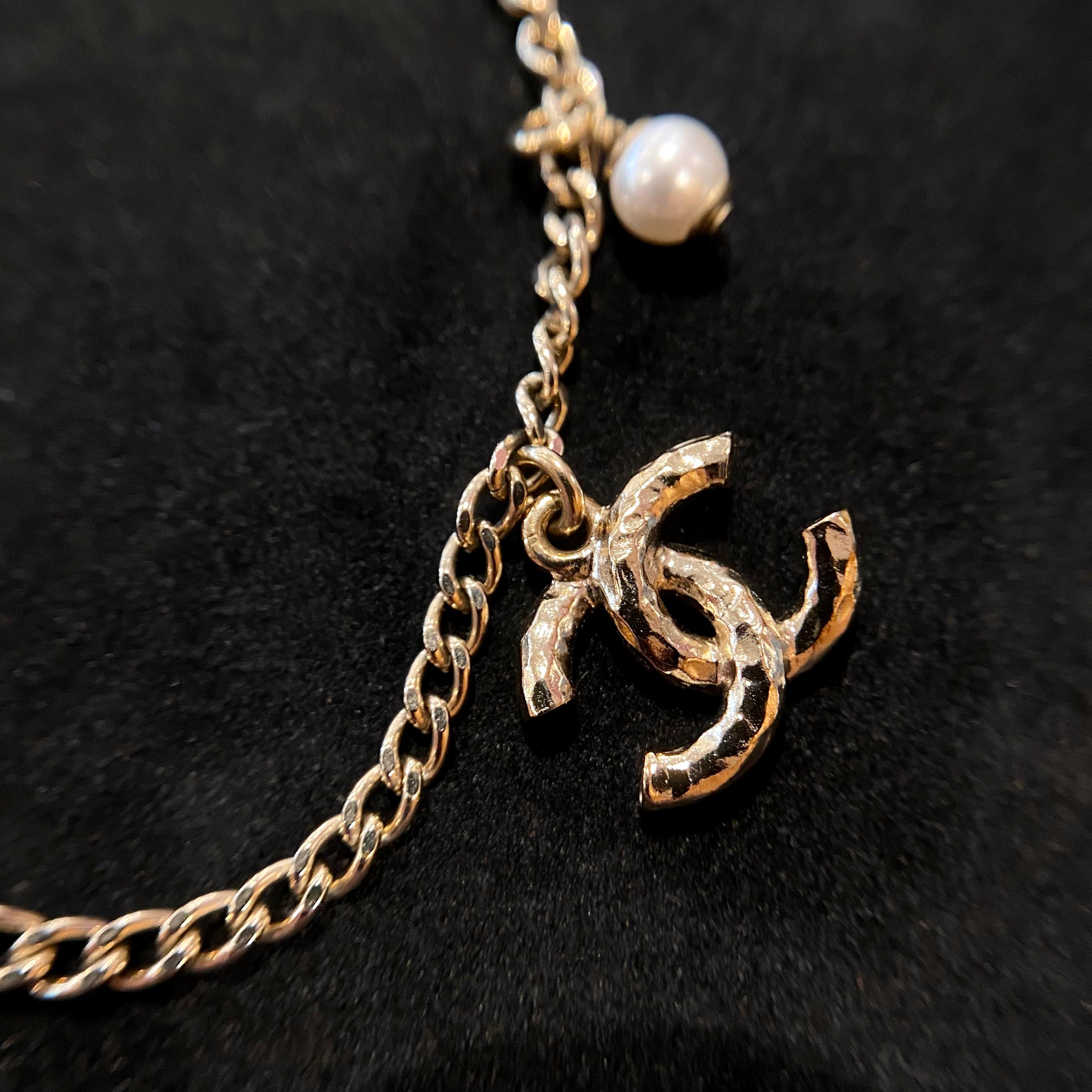 Chanel New Gold Tone CC Logo Rhinestones Dangle Faux Pearl Bracelet C21K, 2021 In Excellent Condition For Sale In Central & Western District, HK