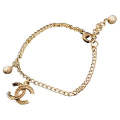 Chanel New Gold Tone CC Logo Rhinestones Dangle Faux Pearl Bracelet C21K, 2021
