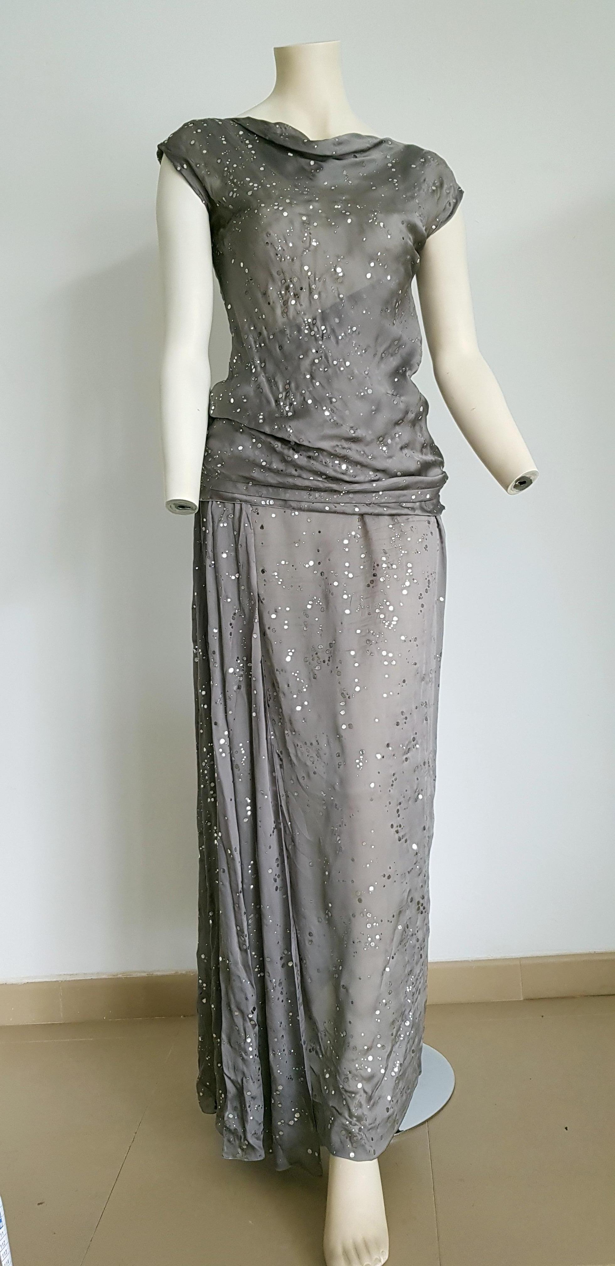 CHANEL Haute Couture, fabric with bright silver application, top with a single shoulder strap, and blouse and skirt. All silk. Gown evening dress - Unworn, New.

SIZE: equivalent to about Small / Medium, please review approx measurements as follows