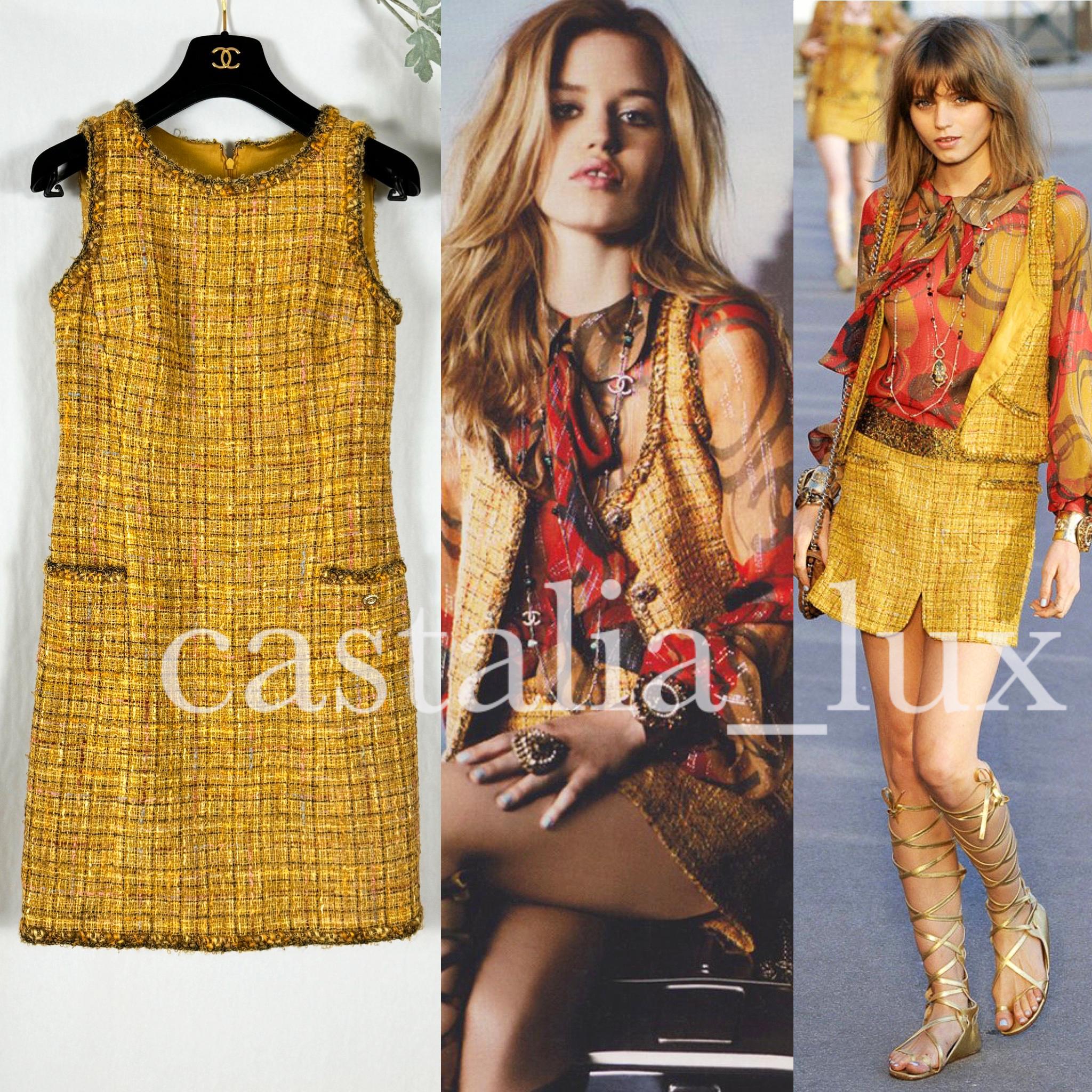 Famous and recognisable Chanel marigold tweed dress from SAINT-TROPEZ Cruise 2011 Collection by Karl Lagerfeld.
- CC logo charm at pocket
- superb Lesage tweed in shades of marigold, yellow, pink 
- signature braided metallic trim
- tonal silk
