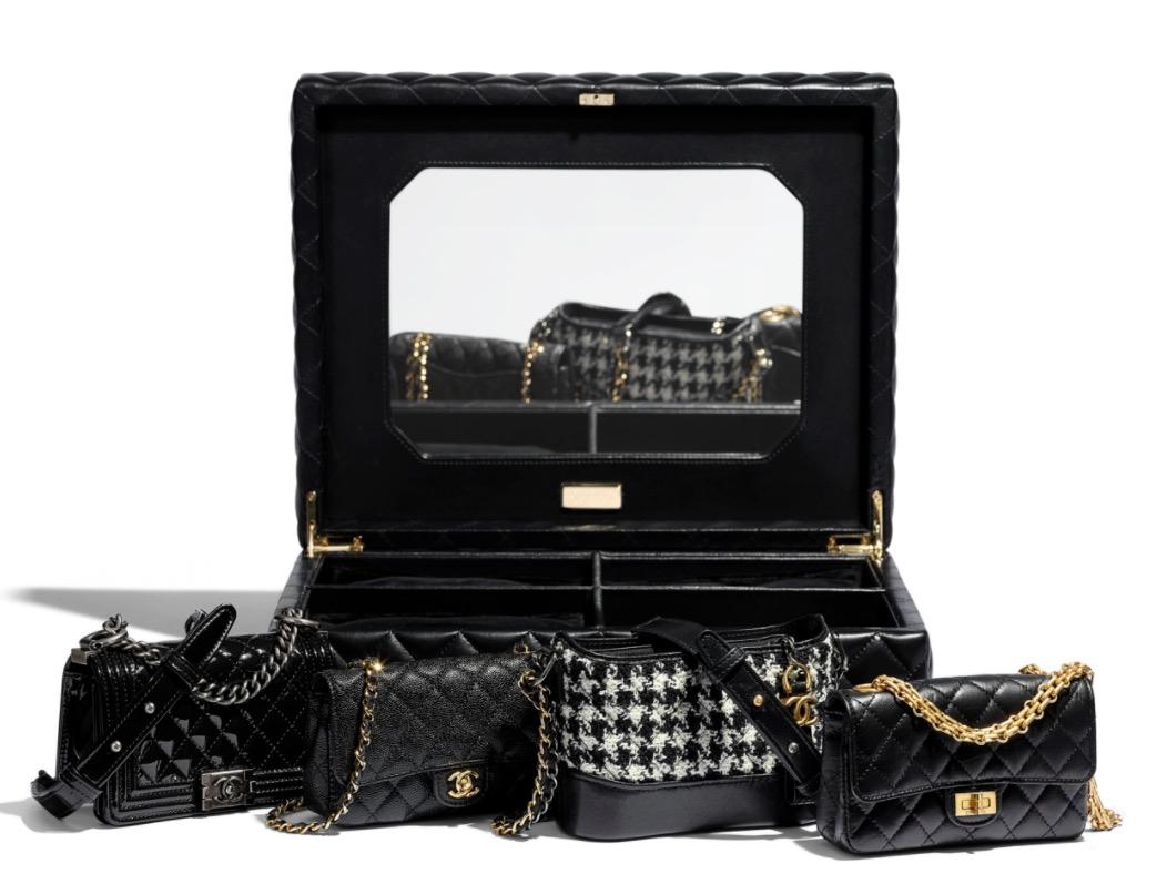 Leather, patent leather and tweed
Gold and silver tone hardware
Leather lining
Bags measure approximately 4.75