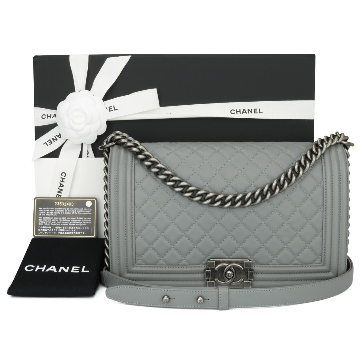 CHANEL New Medium Quilted Boy Bag Grey Calfskin with Ruthenium Hardware 2017.

This stunning bag is still in mint condition, the bag still holds its original shape and the hardware is still very clean and shiny. A truly unique combination and sold
