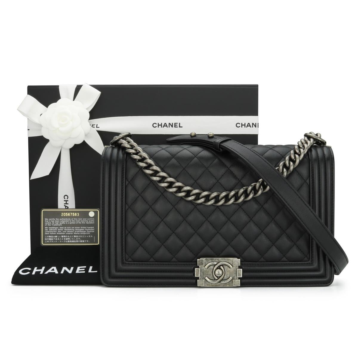 CHANEL New Medium Quilted Boy Bag in Black Calfskin with Ruthenium Hardware 2015 – 15C.

This stunning bag is still in very good condition. It still holds its original shape, and the hardware is still very clean and shiny.

- Exterior Condition: