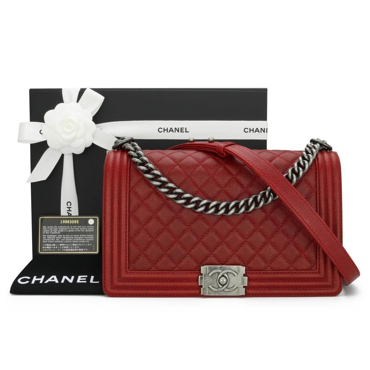 CHANEL New Medium Quilted Boy Bag in Dark Red Caviar with Ruthenium Hardware 2014 – 14B.

This stunning bag is still in very good condition. It still holds its original shape, and the hardware is still very clean and shiny.

- Exterior Condition: