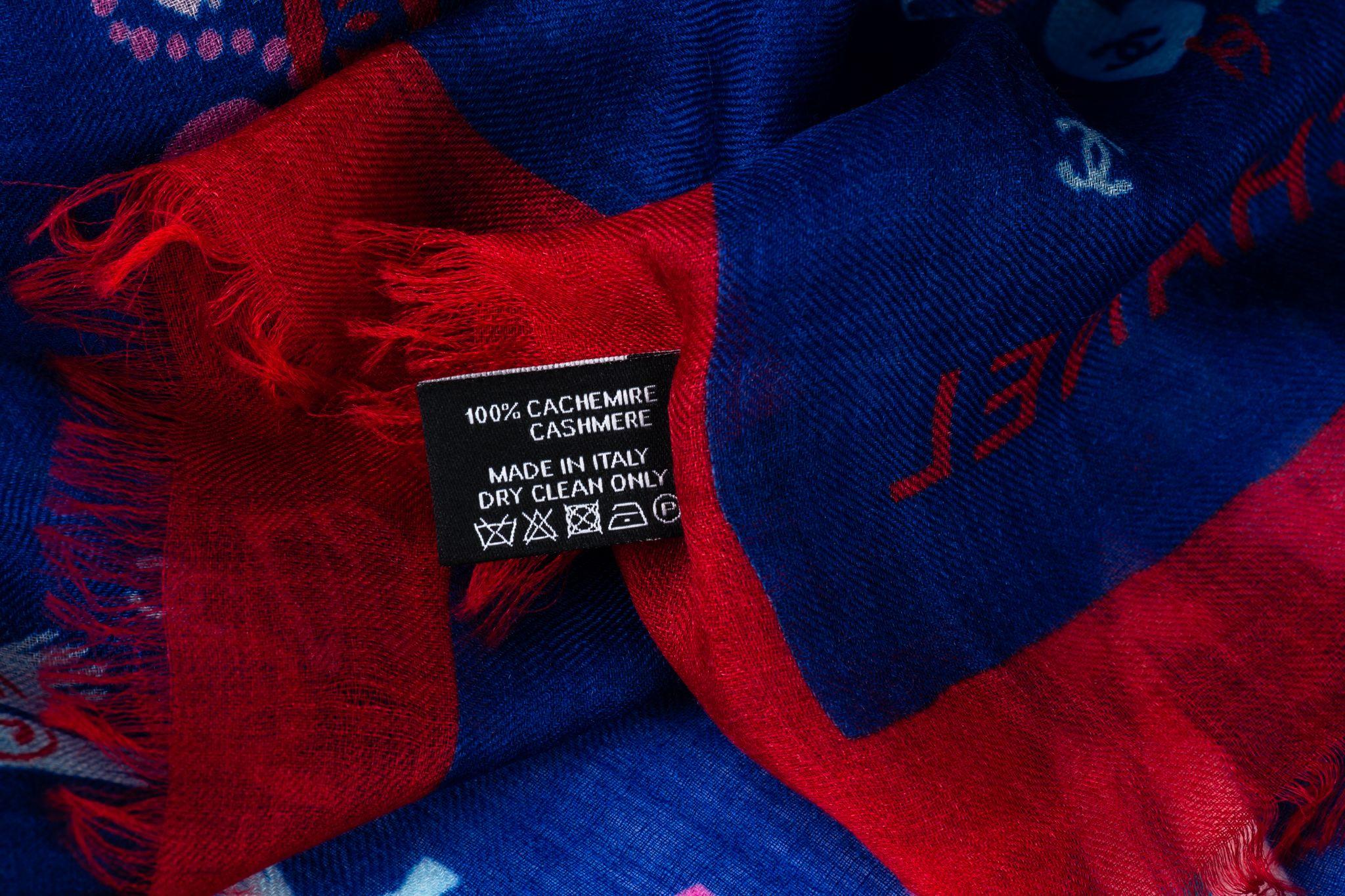 Chanel new lettering cashmere shawl in navy blue and red . Original care tag.