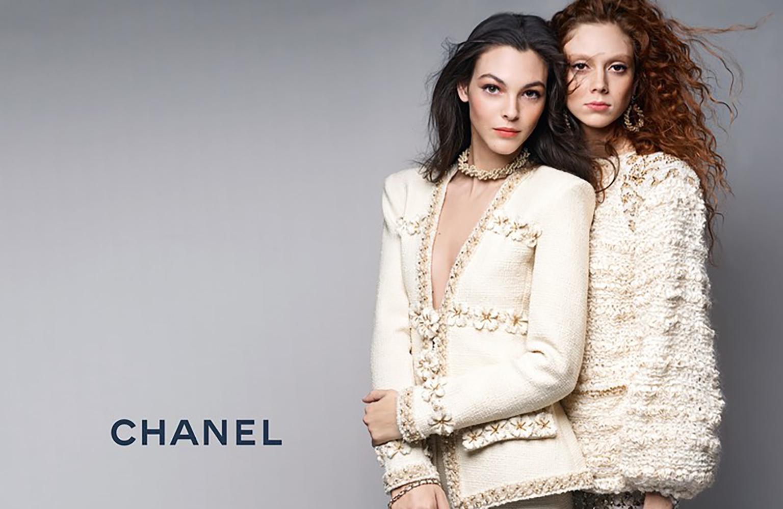 Statement Chanel black tweed jacket ~ in interpretation of Paris / COSMOPOLITE Collection by Karl Lagerfeld
Most recognisable piece of the collection!
- CC logo massive buttons
- contrast braided metallic trim
- black silk lining, chain link at