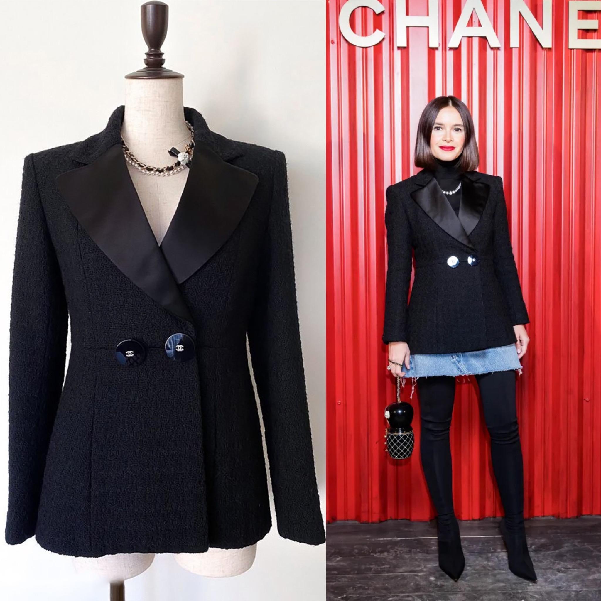 Most recognisable tweed jacket from Paris / COSMOPOLITE Fashion Show in Ritz.!
Black tweed jacket as seen in wardrobes of many it-gils
- CC logo giant lucite buttons with crystals
- black silk lining, chain link at hem
Size mark 42 FR. Never worn.
