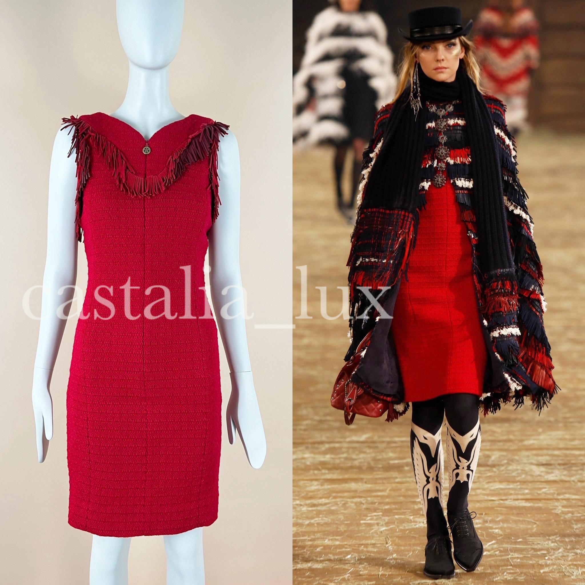 New stunning red tweed dress with leather fringe details from Runway of Paris / Dallas 2014 Pre-fall collection
Size mark 34 fr. NEVER WORN.
- CC logo star charm zip at front 
- full silk lining