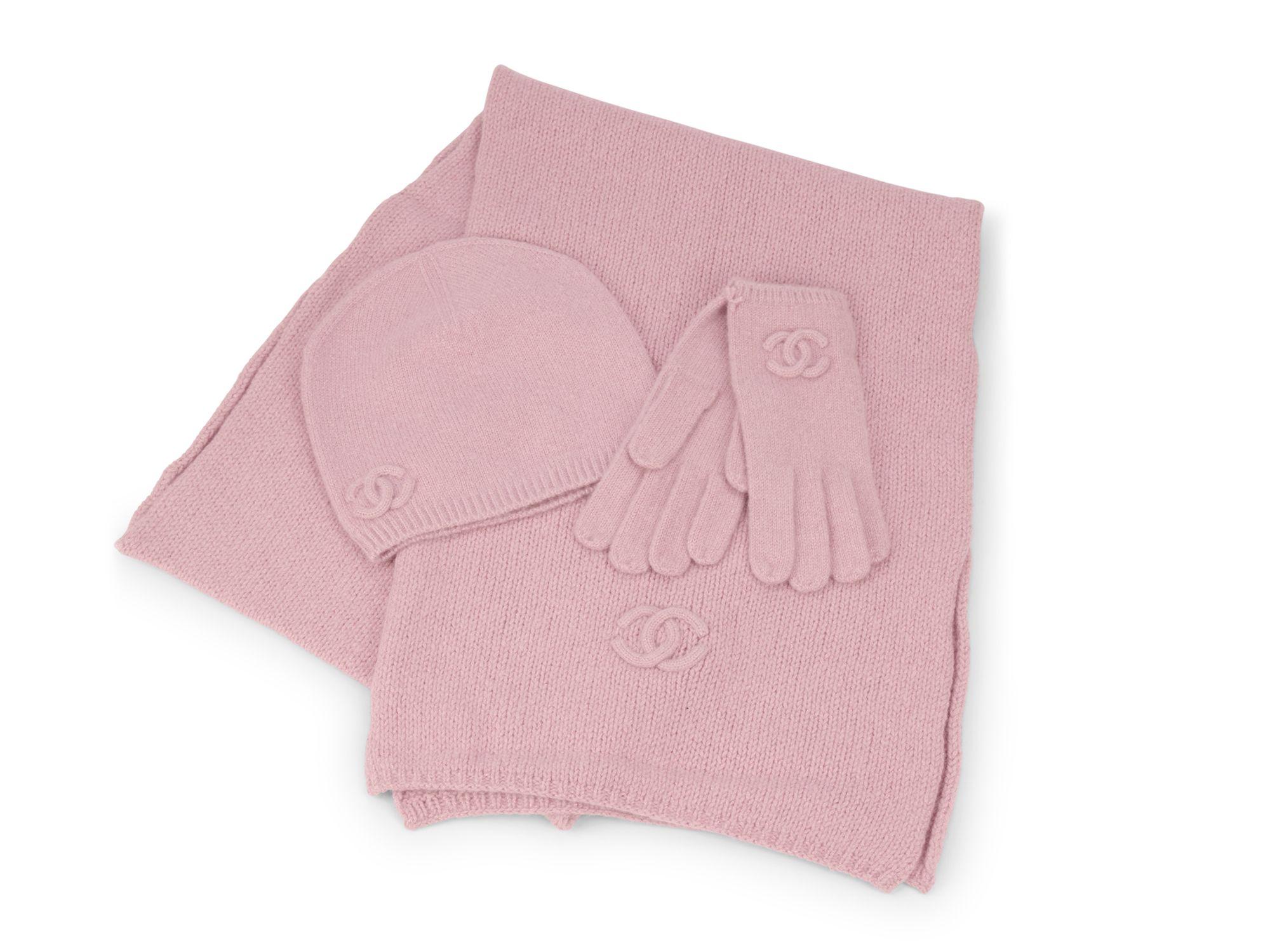 Chanel Winter Accessory Set includes a hat, scarf and gloves in a beautiful pink color. Brand new in unused condition. Gloves size 7/7.5. Hat medium.