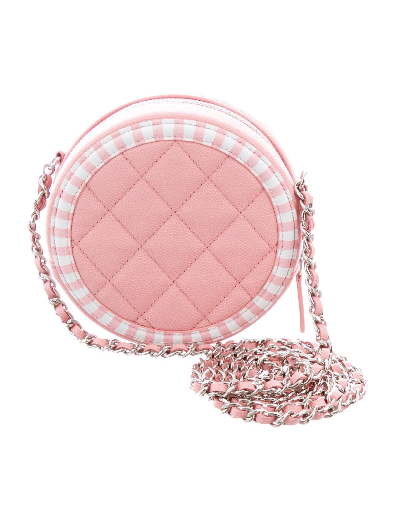 Chanel NEW Pink White Leather Circle Silver Small Evening Shoulder Bag in Box

Caviar leather
Silver tone hardware 
Woven interior 
Zipper closure
Date code present
Made in Italy
Shoulder strap drop 23.75