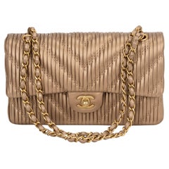 Chanel New Plissee Gold Doppelklappe