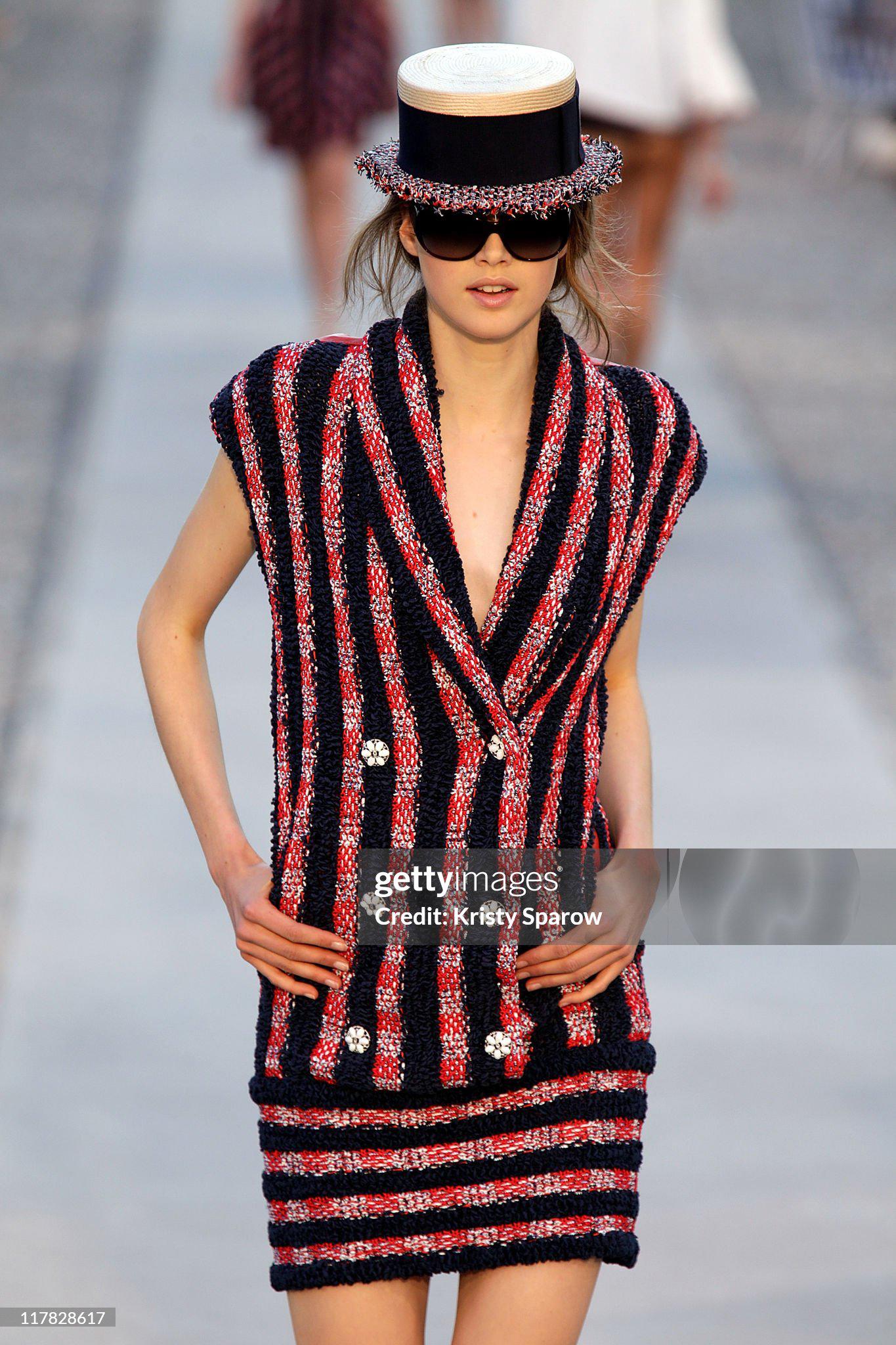 Rare, collectors Chanel navy and red woven tweed jacket from Runway of LA RIVIERA 2012 Cruise Collection
- CC logo jewel buttons
Size mark 36 FR. Comes with pouch tag.