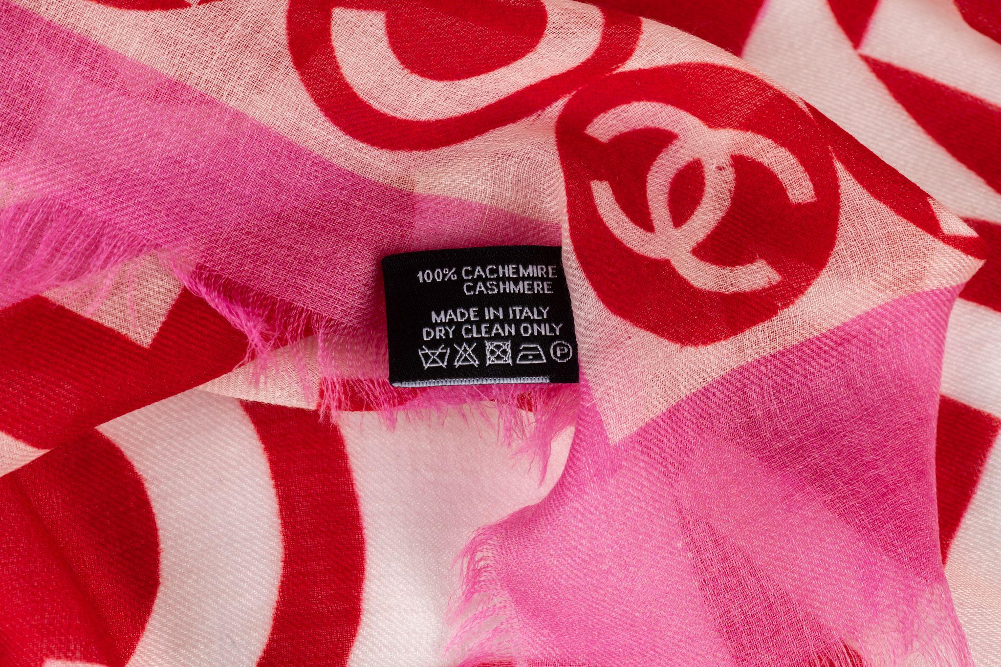 Chanel new writing logo cashmere shawl in white, red and fuchsia . Original care tag.