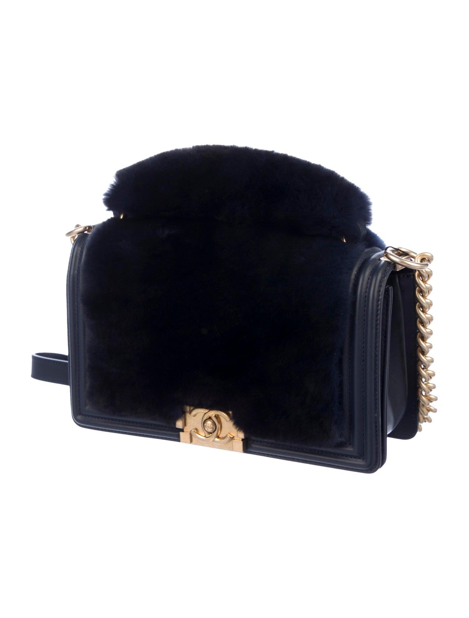 Leather
Rabbit fur
Gold-tone hardware
Leather lining
Push-lock closure 
Made in Italy
Date code present
Shoulder drop 22