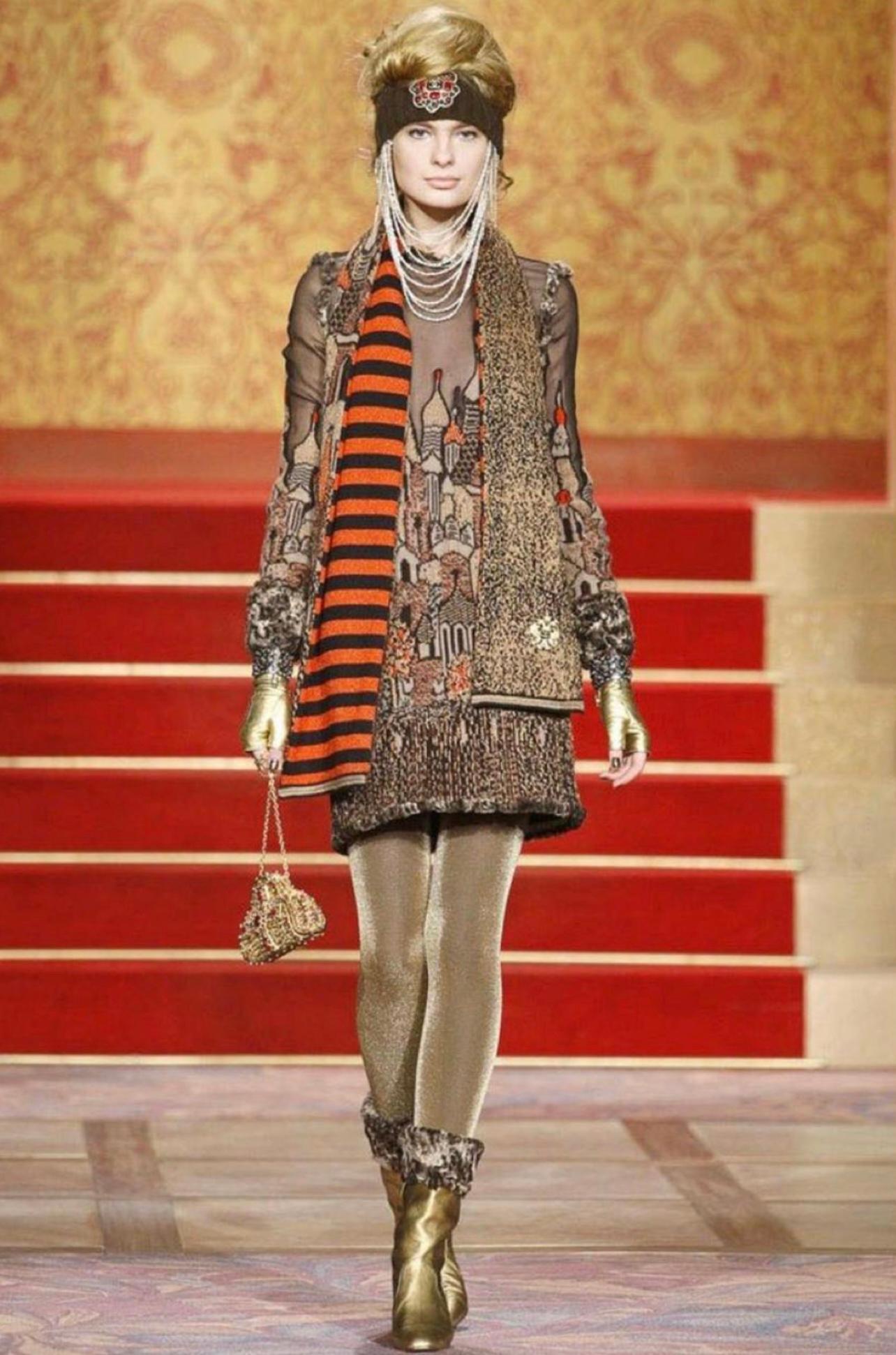 Stunning Chanel dress from Runway of Metiers d'Art Collection 2009, as seen on Supermodel Natalia Vodianova.
Retail price was about 9,000$
- CC logo ' matryoshka ' buttons at back
- sheer black details
Size mark 34 FR, may fit also 36 FR, condition