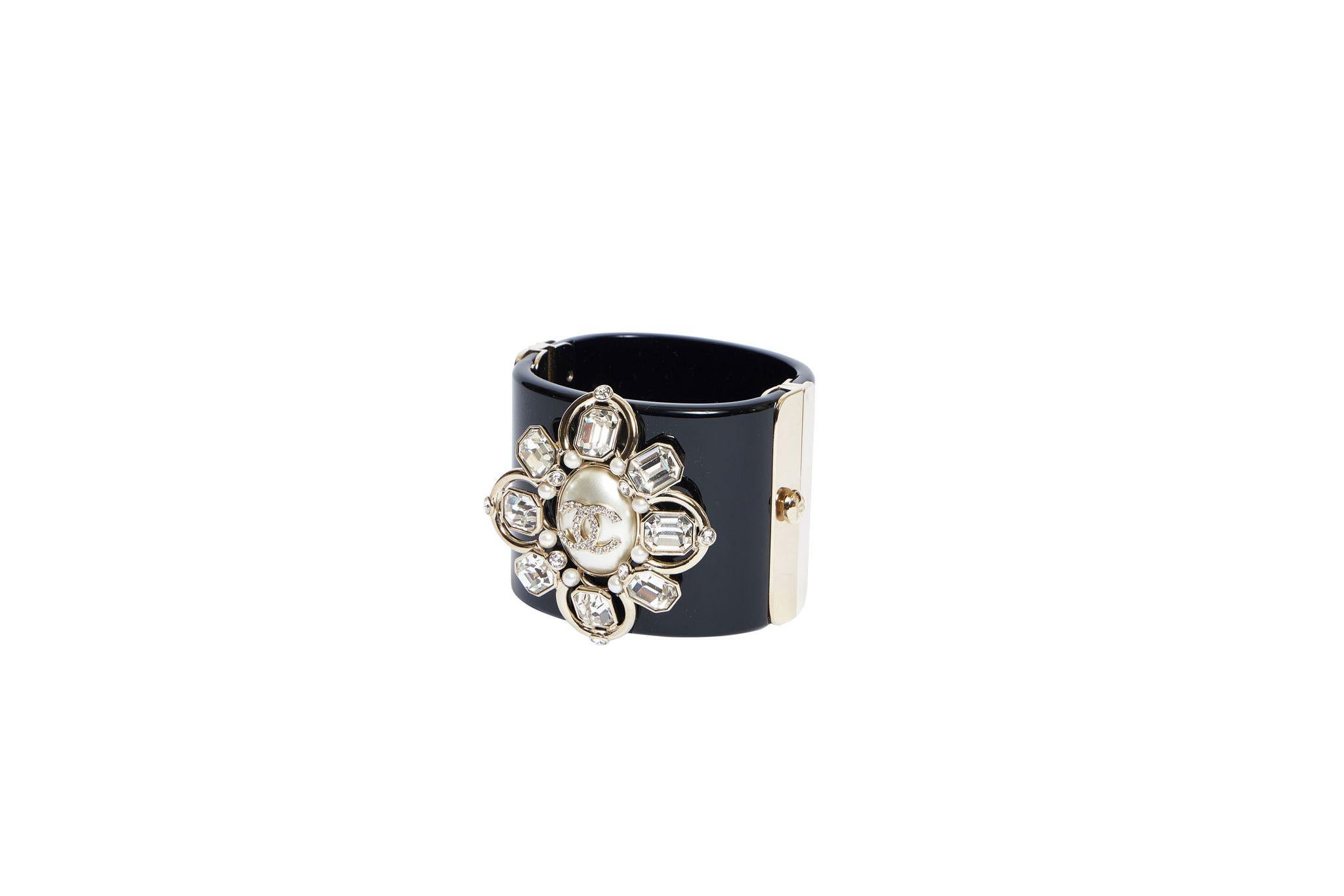 Chanel new in box black lucite hinged cuff bracelet with maltese cross jeweled center. Collection 2021/22 FW. Comes with original box .