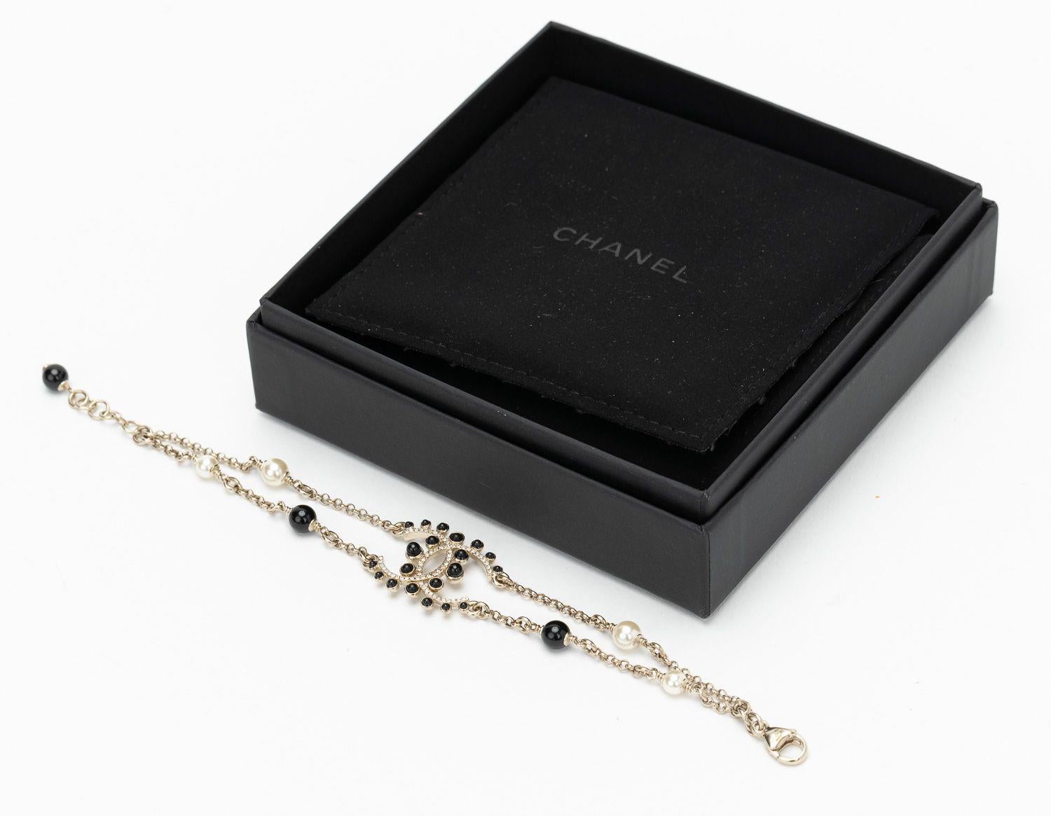 Women's Chanel NIB Champagne Gold Bracelet With Black Gripoix and Rhinestones  For Sale