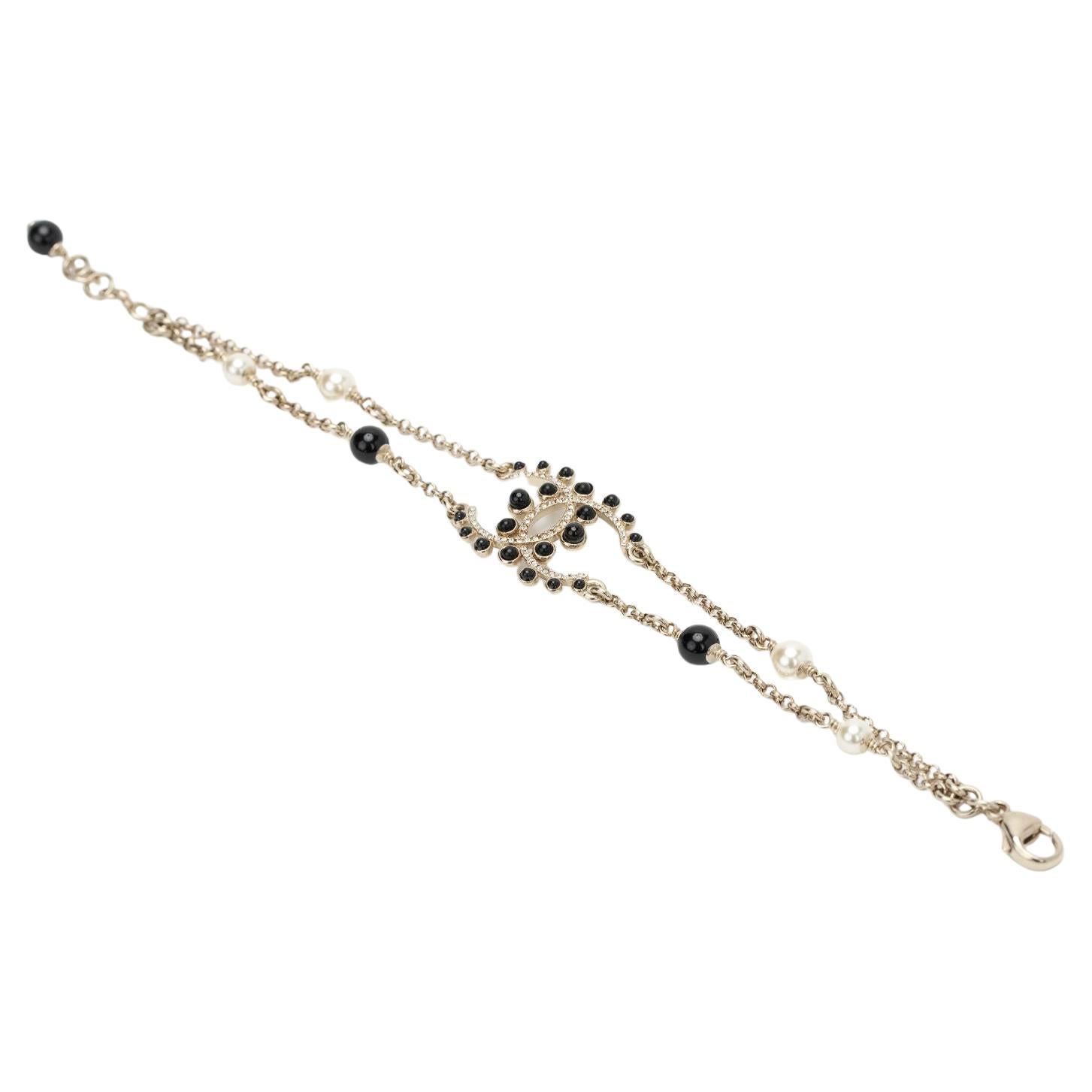 Chanel NIB Champagne Gold Bracelet With Black Gripoix and Rhinestones  For Sale