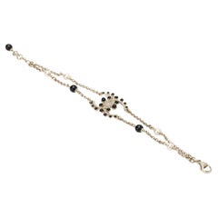 Chanel NIB Champagne Gold Bracelet With Black Gripoix and Rhinestones