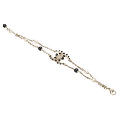 Chanel NIB Champagne Gold Bracelet With Black Gripoix and Rhinestones 