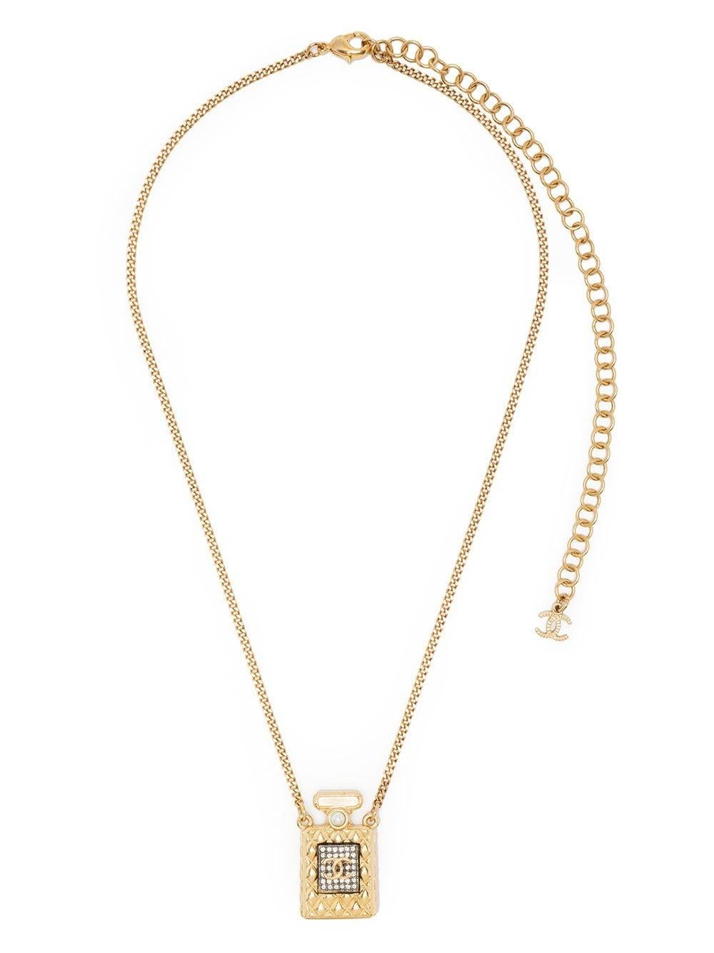 Crafted in France, this elegant pre-owned necklace from Chanel is a unique piece that adds a touch of excitement to almost any outfit. Featuring the signature Chanel No. 5 perfume bottle design, this distinctive piece is the perfect accessory for