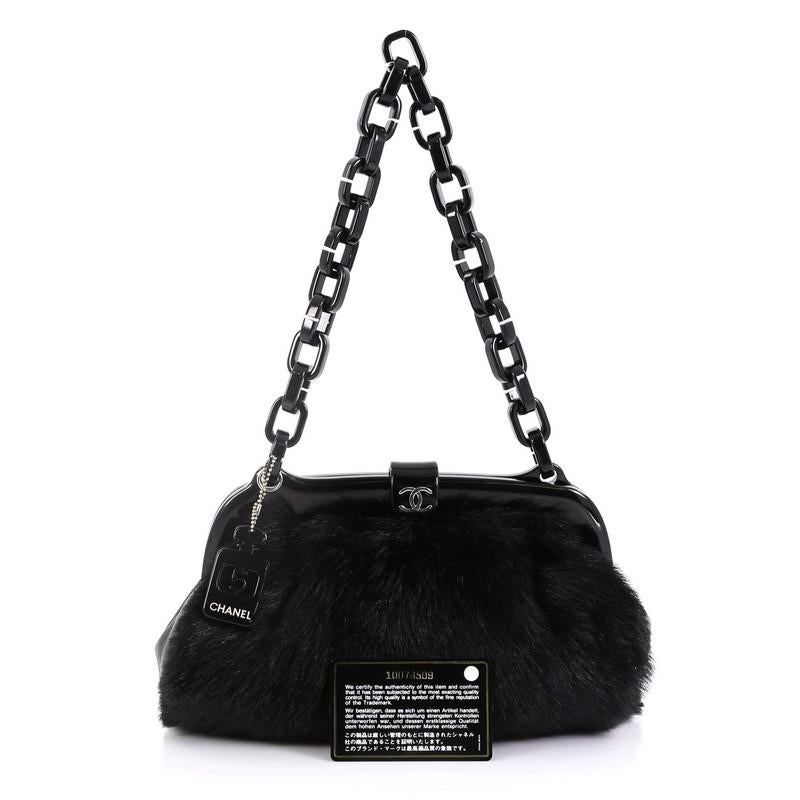 This Chanel No. 5 Resin Chain Frame Shoulder Bag Fur Medium, crafted from black fur, features resin chain link strap, frame top bar with CC logo, and silver and black-tone hardware. It opens to a black fabric interior with slip pocket. Hologram